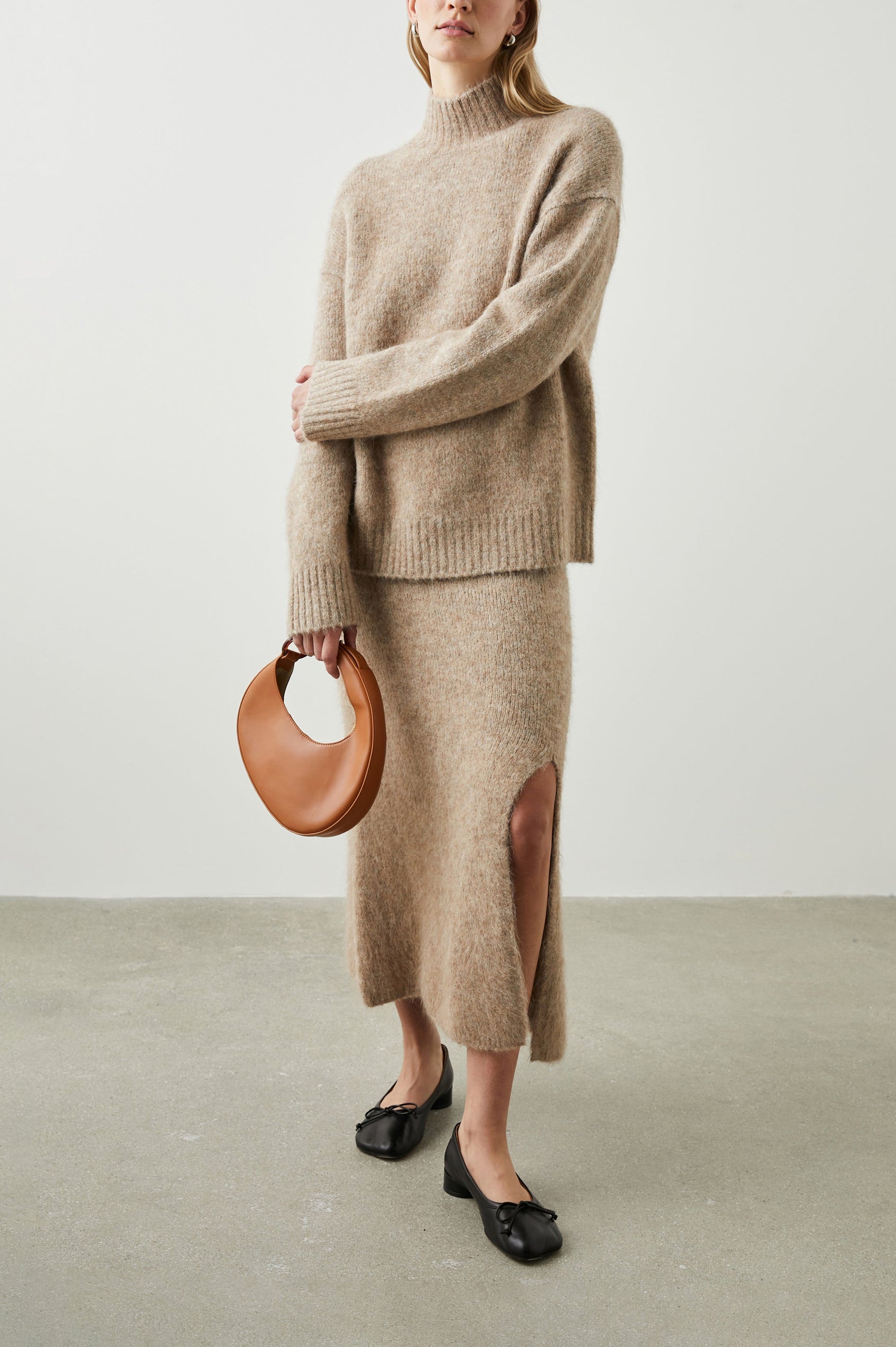 Kacia Long-Sleeve Sweater with a Mock Neck and Ribbed Trim in Oatmeal Colorway - Front Full Body View Featured on Model 