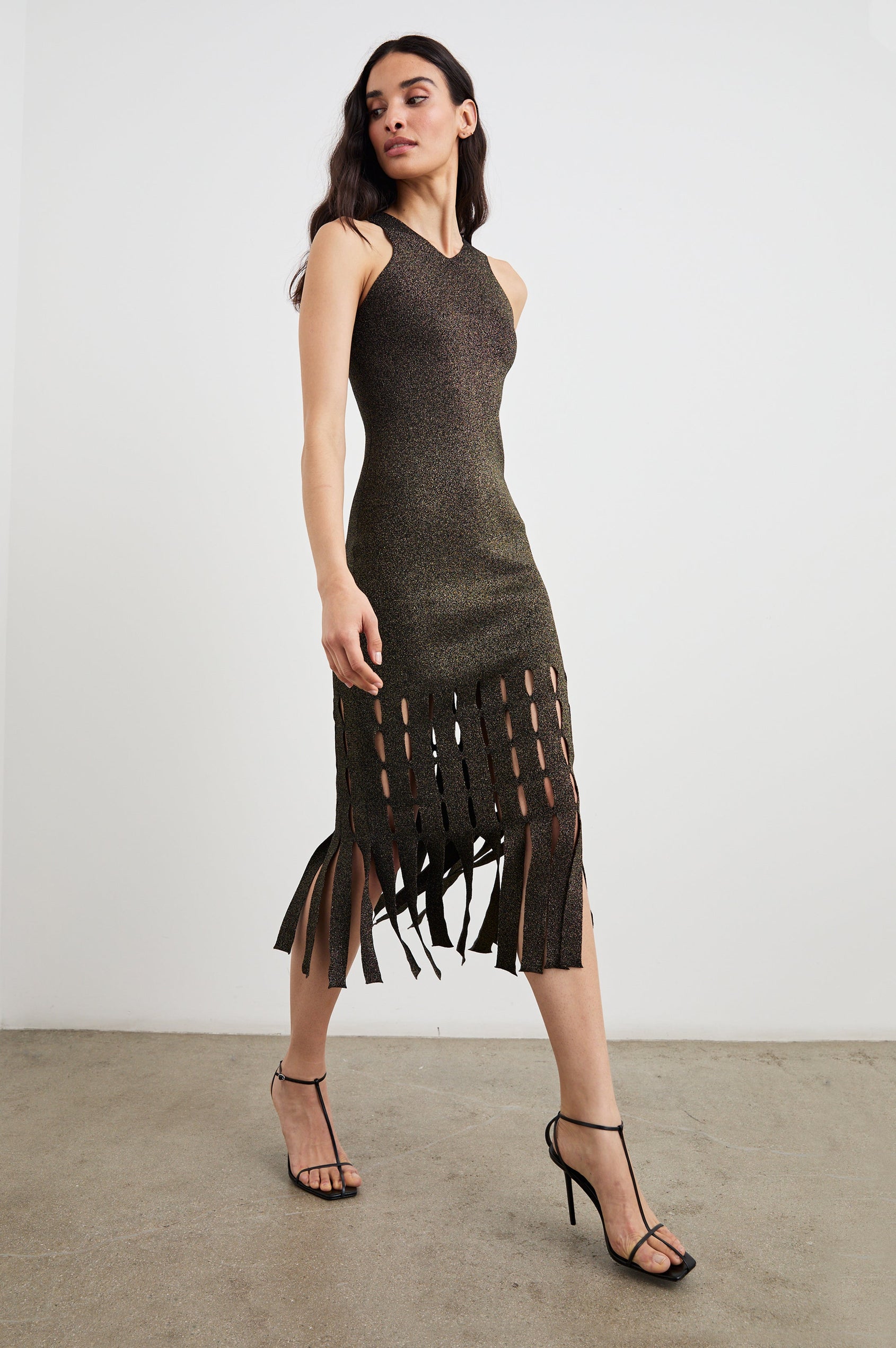 Kaia Sleeveless Midi Dress with a V Neck and Vertical Dashed Cutouts From the Thigh Downward, ending in Panels in Gold Lurex Colorway - Front Full Body View Featured on Model