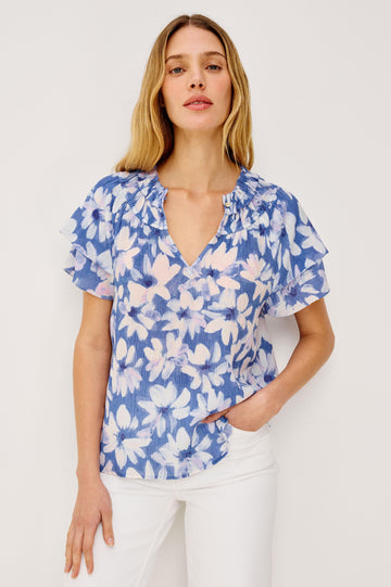 Kamila Top in Chiffon With Elastic Ruffle Collar, V-Neck, and Tiered Flutter Sleeves in Blue Amaranth Colorway - Upper Body Front View Featured on Model