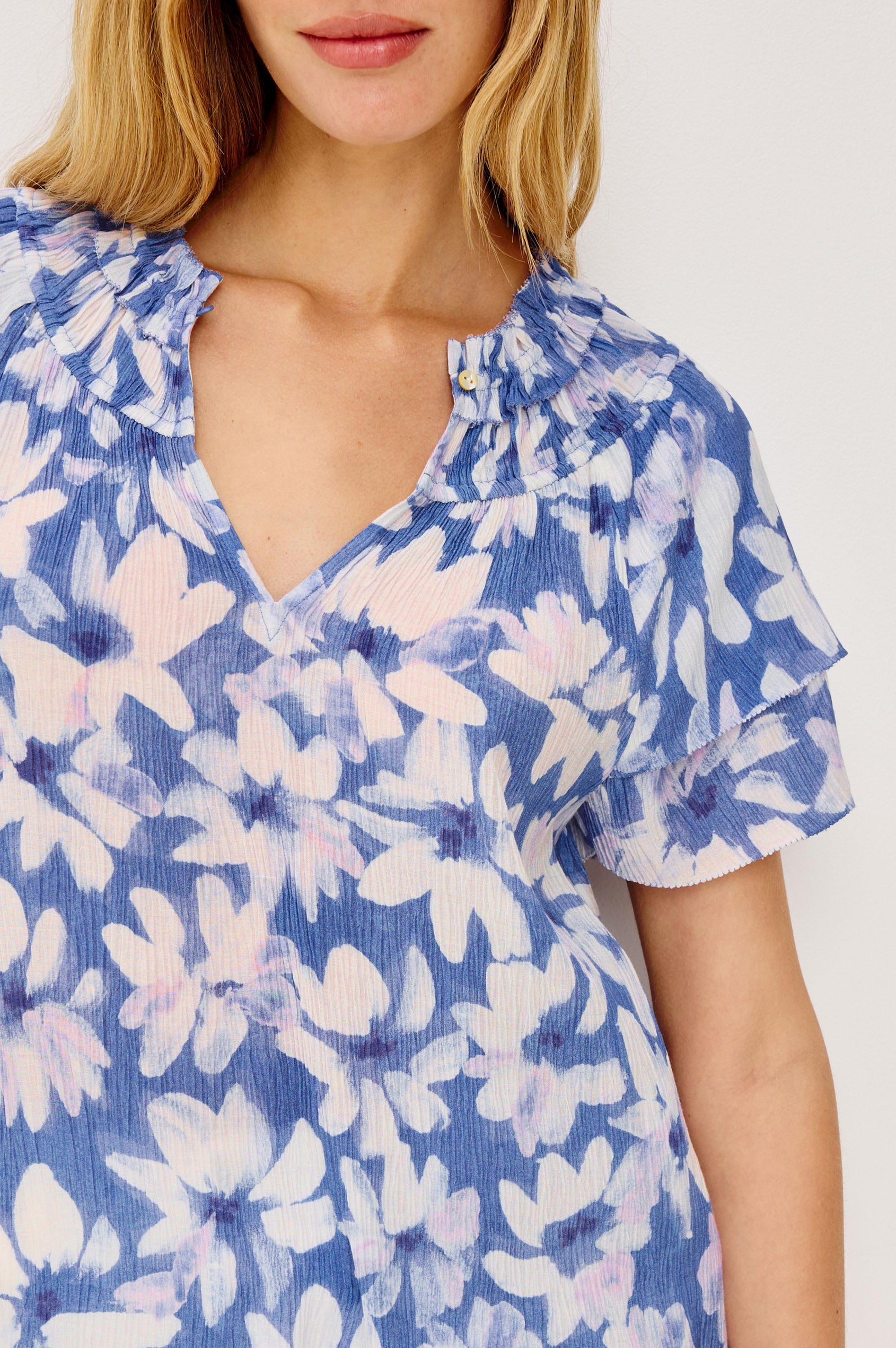 Kamila Top in Chiffon With Elastic Ruffle Collar, V-Neck, and Tiered Flutter Sleeves in Blue Amaranth Colorway - Upper Body Front View Featured on Model