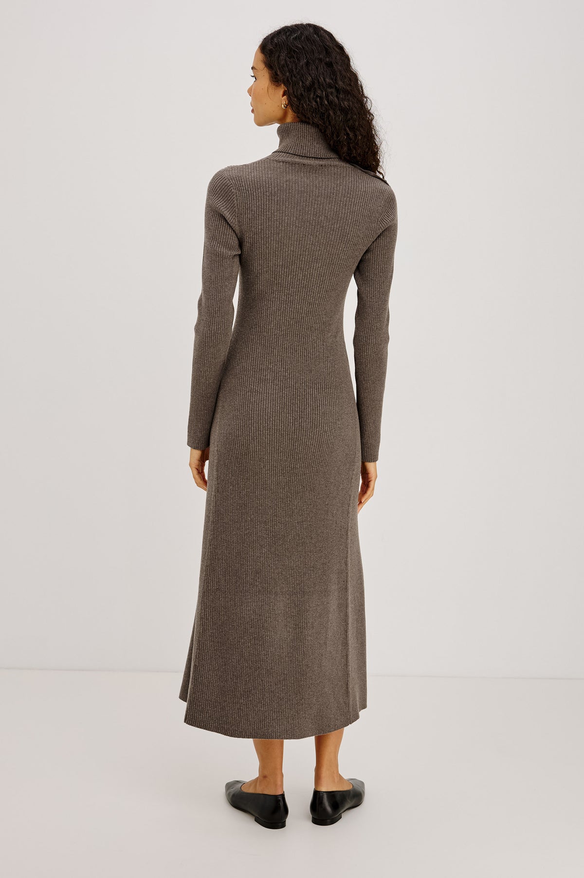 Kat Maxi Dress in Ribbed Cotton Blend With Foldover Turtleneck Button Neckline, Long Sleeves, Fitted Silhouette, Long Sleeves, Side Placket, and Subtle Flare at Hem in Hazelnut Colorway - Full Body Front View Featured on Model