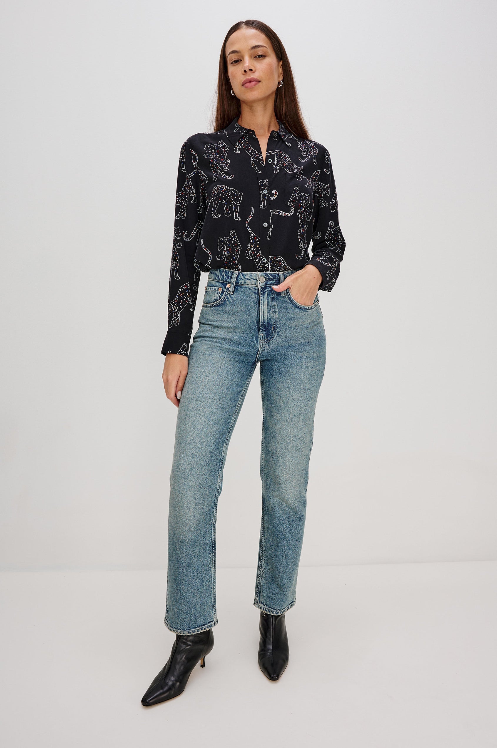 Washed silk button-down shirt in ivory with a horse print. The shirt has a soft drape and classic collar for a polished look. Full Body Front View on Model.