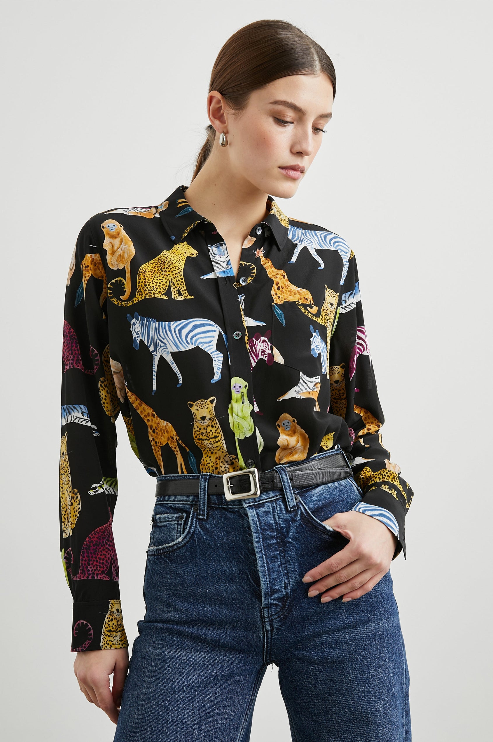 Kate Long Sleeve Button up with a Chest Patch Pocket in Illustrated Animals Colorway, Wild Animals on Black - Front Tucked View Featured on Model