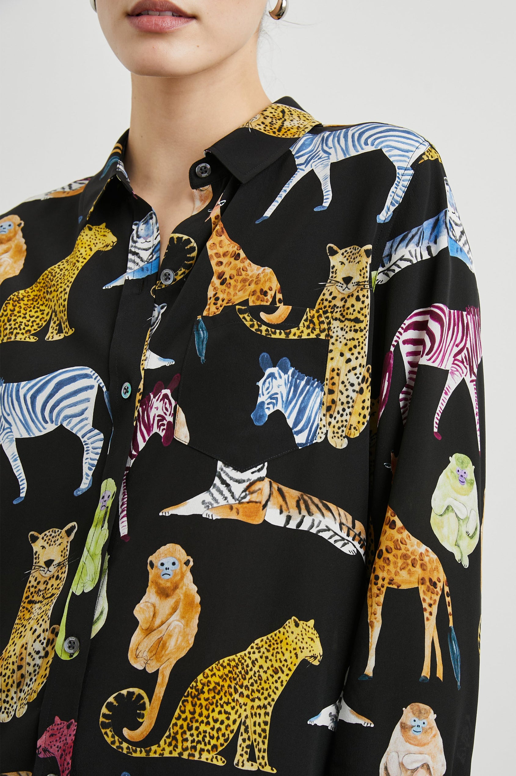 Kate Long Sleeve Button up with a Chest Patch Pocket in Illustrated Animals Colorway, Wild Animals on Black - Front View Featured on Model