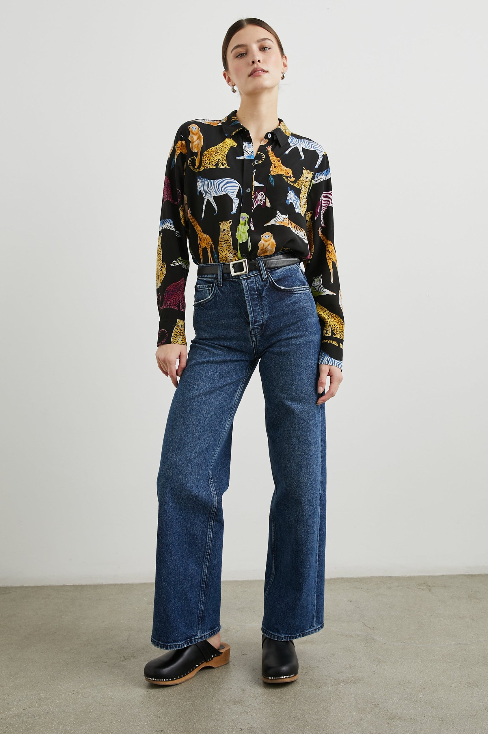 Kate Long Sleeve Button up with a Chest Patch Pocket in Illustrated Animals Colorway, Wild Animals on Black - Front Tucked Full Body View Featured on Model