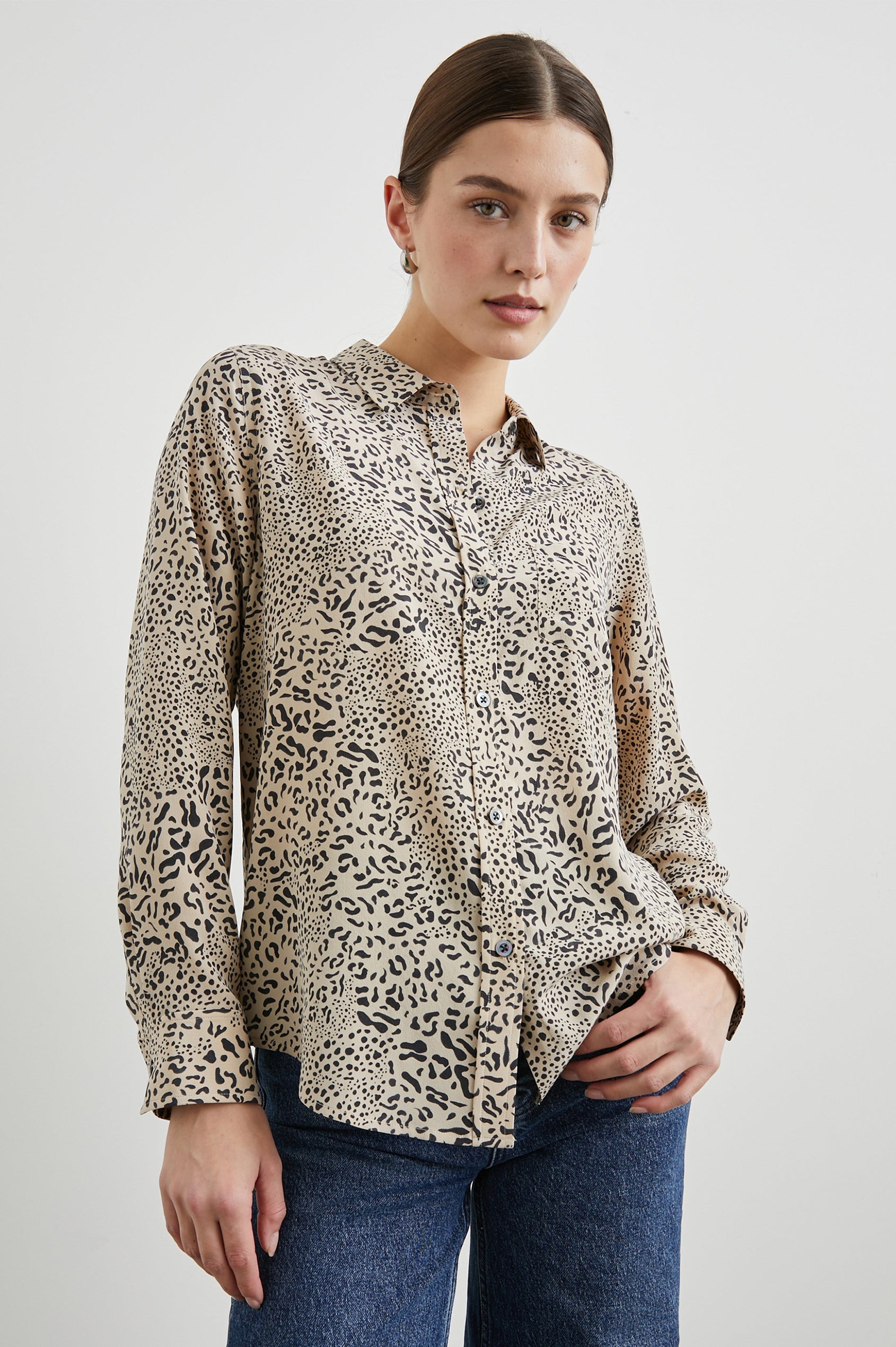 Kate Long Sleeve Button up with a Chest Patch Pocket in Sand Mixed Cheetah Colorway, Black Cheetah Spots on Sand - Front View Featured on Model