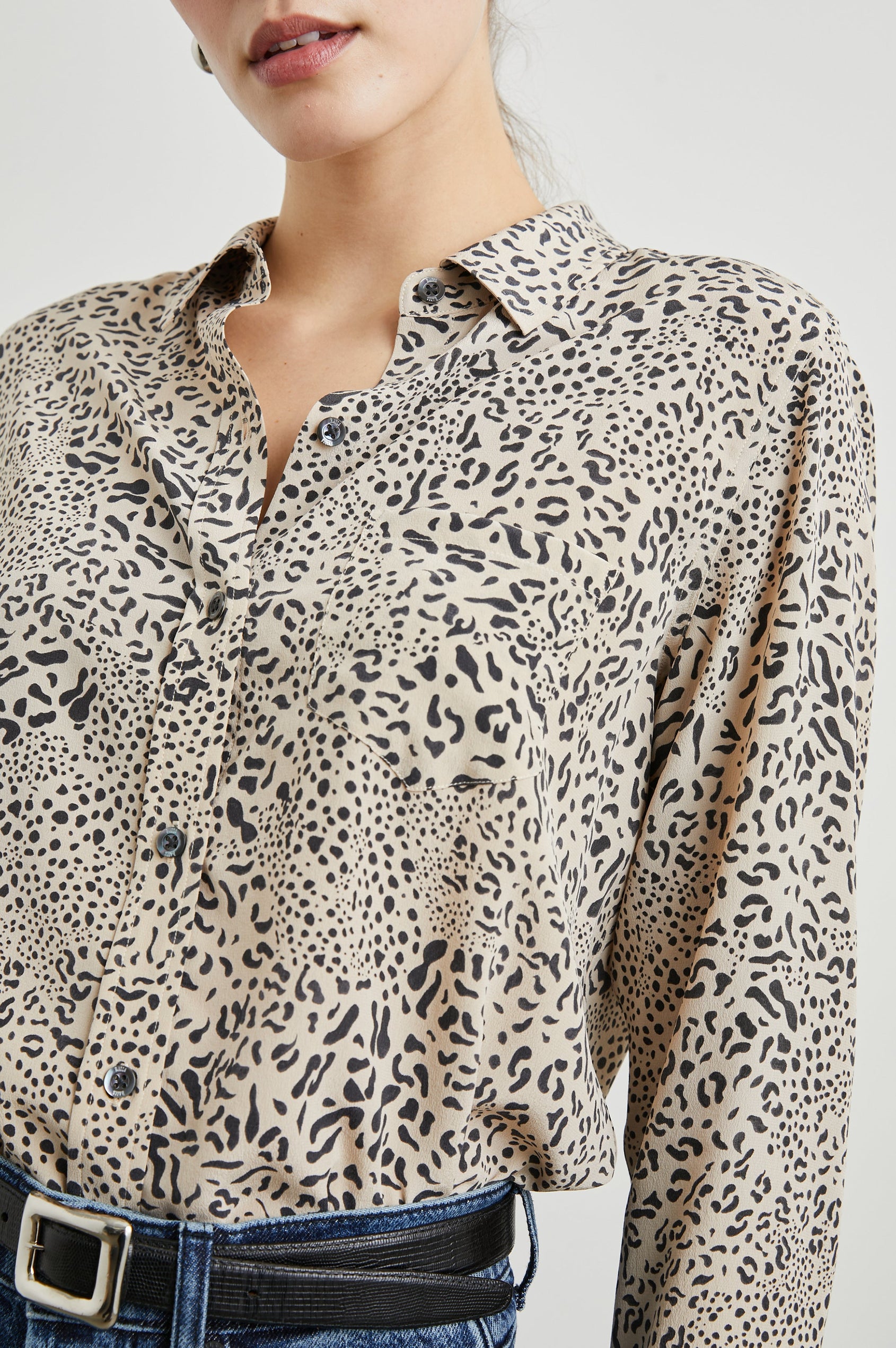 Kate Long Sleeve Button up with a Chest Patch Pocket in Sand Mixed Cheetah Colorway, Black Cheetah Spots on Sand - Front Tucked View Featured on Model