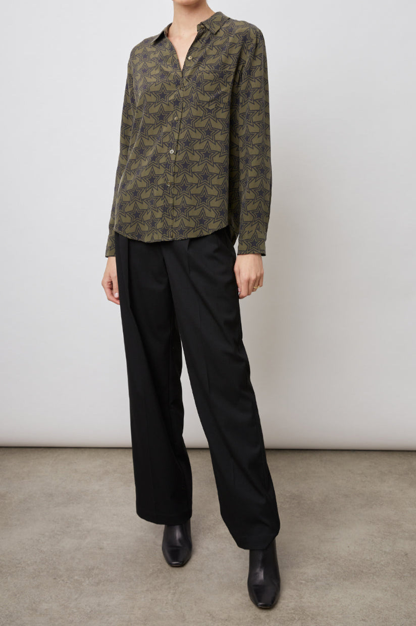 Kate Long Sleeve Button up with a Chest Patch Pocket in Olive Stargaze Colorway, Black Stars on Olive  - Front Full Body View Featured on Model