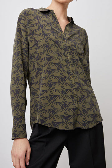 Kate Long Sleeve Button up with a Chest Patch Pocket in Olive Stargaze Colorway, Black Stars on Olive  - Front View Featured on Model