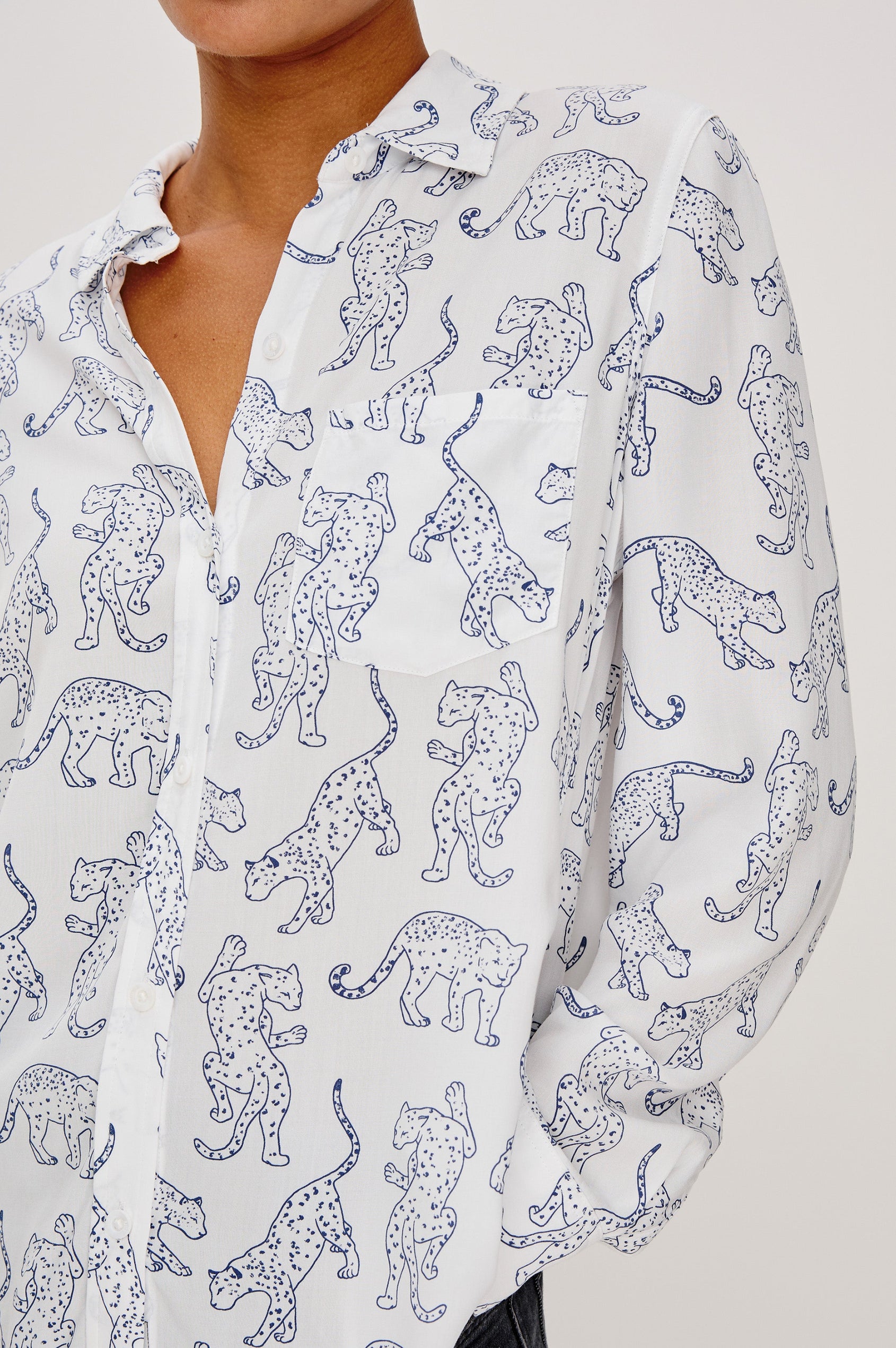 Kathryn Long-Sleeve Button up with a Chest Patch Pocket in Cobalt Jaguar Colorway, with lightly sketched jaguar pattern - Close up of Details on Model