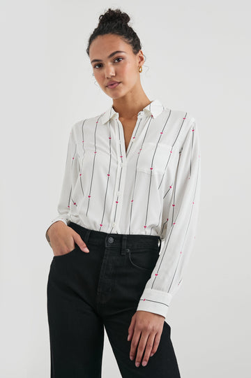 Kathryn Long-Sleeve Button up with a Chest Patch Pocket in Striped Hearts Colorway, with vertical blue stripes dashed with pink hearts on ivory - Front View Featured on Model
