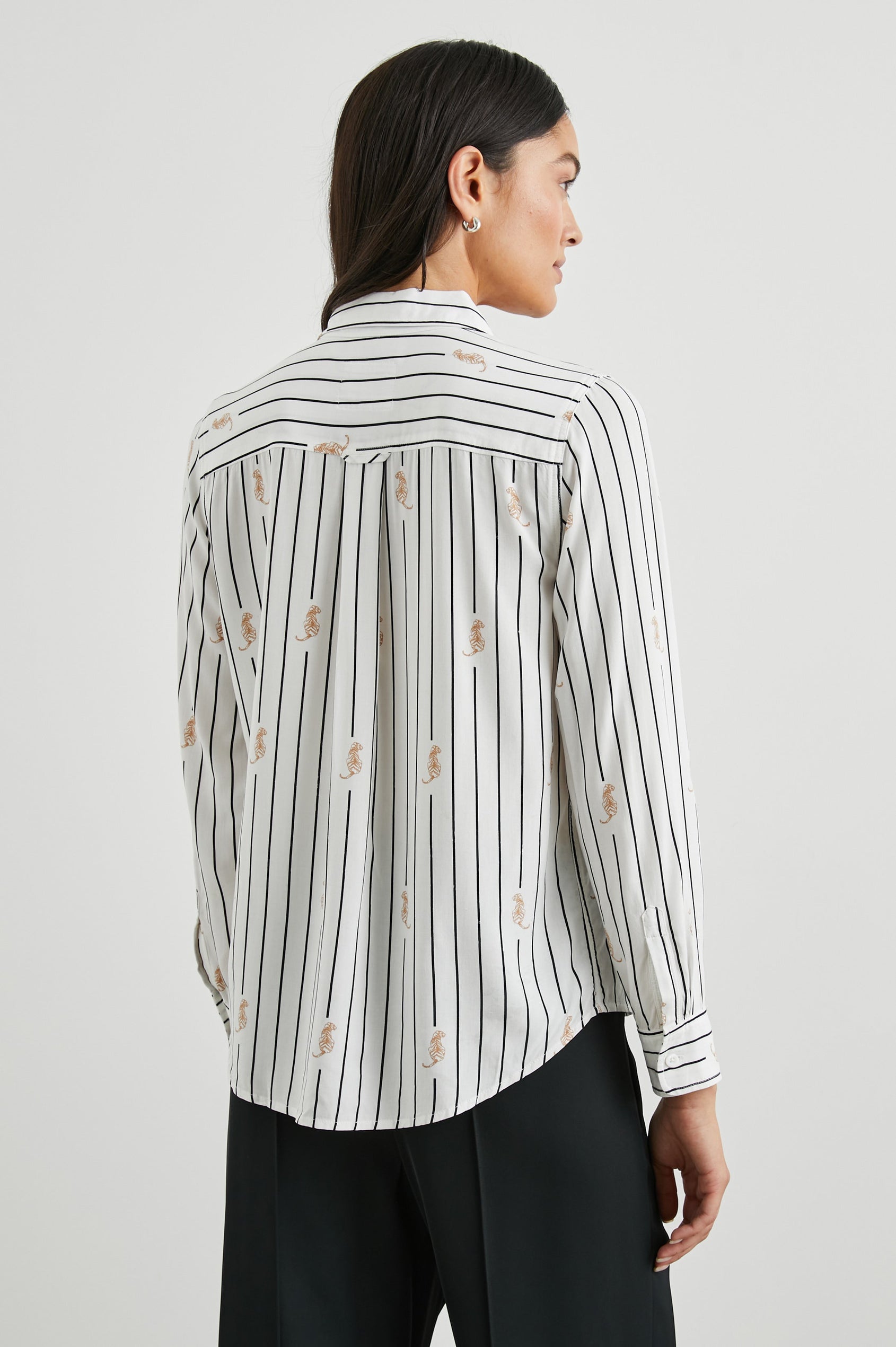 Kathryn Long-Sleeve Button up with a Chest Patch Pocket in Striped Tigers Colorway, with vertical blue lines dashed with tigers on ivory - Back View Featured on Model