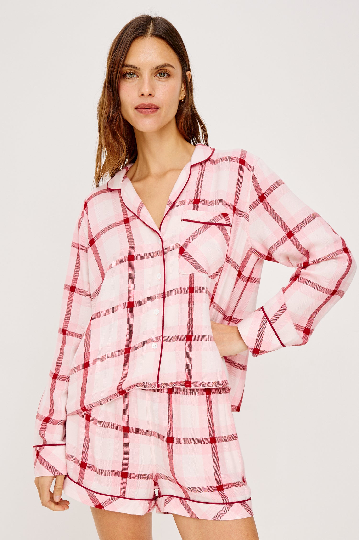 Kellen Pajama Set in Signature Rayon With Relaxed Long Sleeve Button-Up Shirt With Notched Collar and Matching High-Waisted Shorts With Adjustable Drawstring Ties in Pink Cherry Plaid Colorway - Upper Body Front View Featured on Model