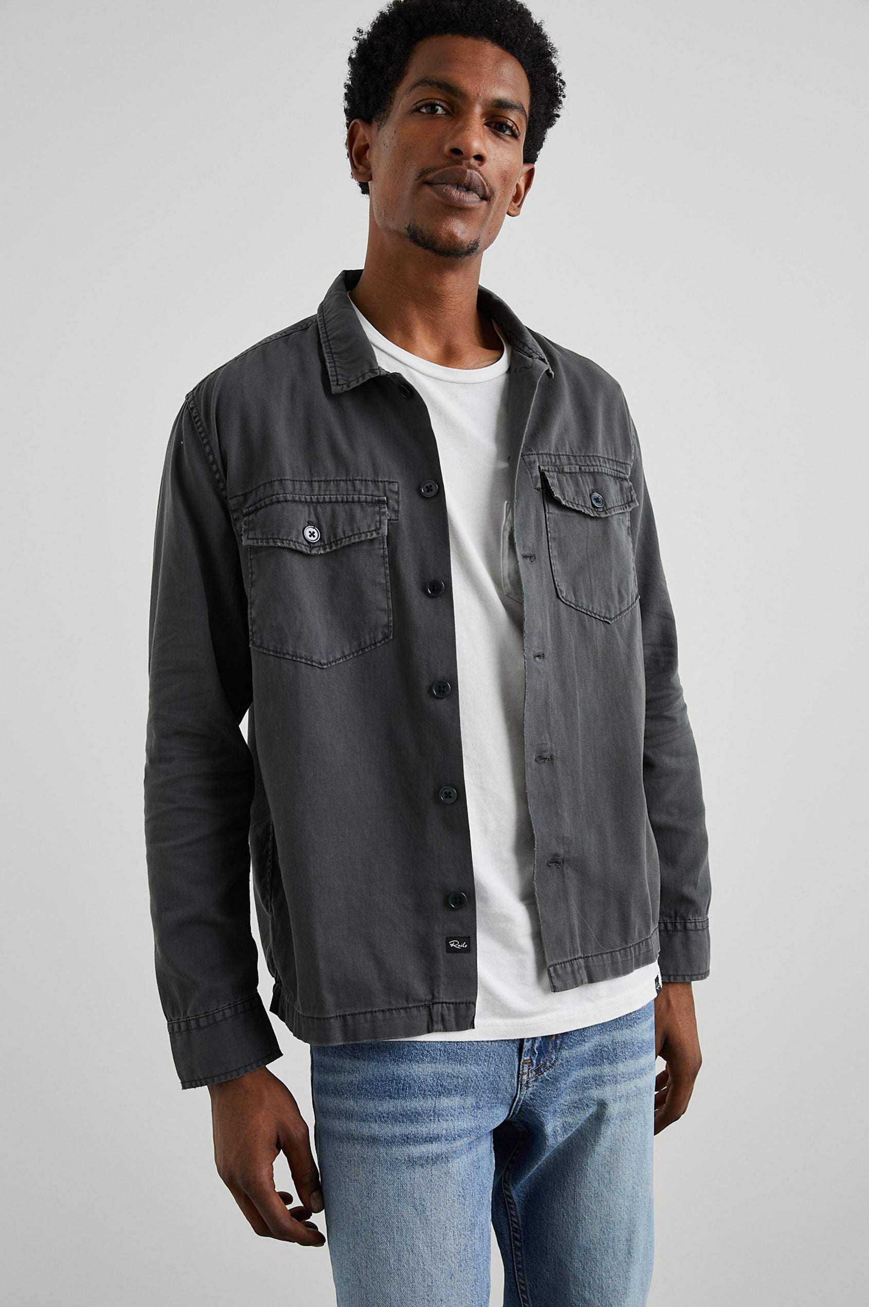 Kerouac Long-Sleeve Shirt Jacket with Button Closure and Two Button Chest Flap Pockets in Charcoal Colorway  - Front Unbuttoned View Featured on Model
