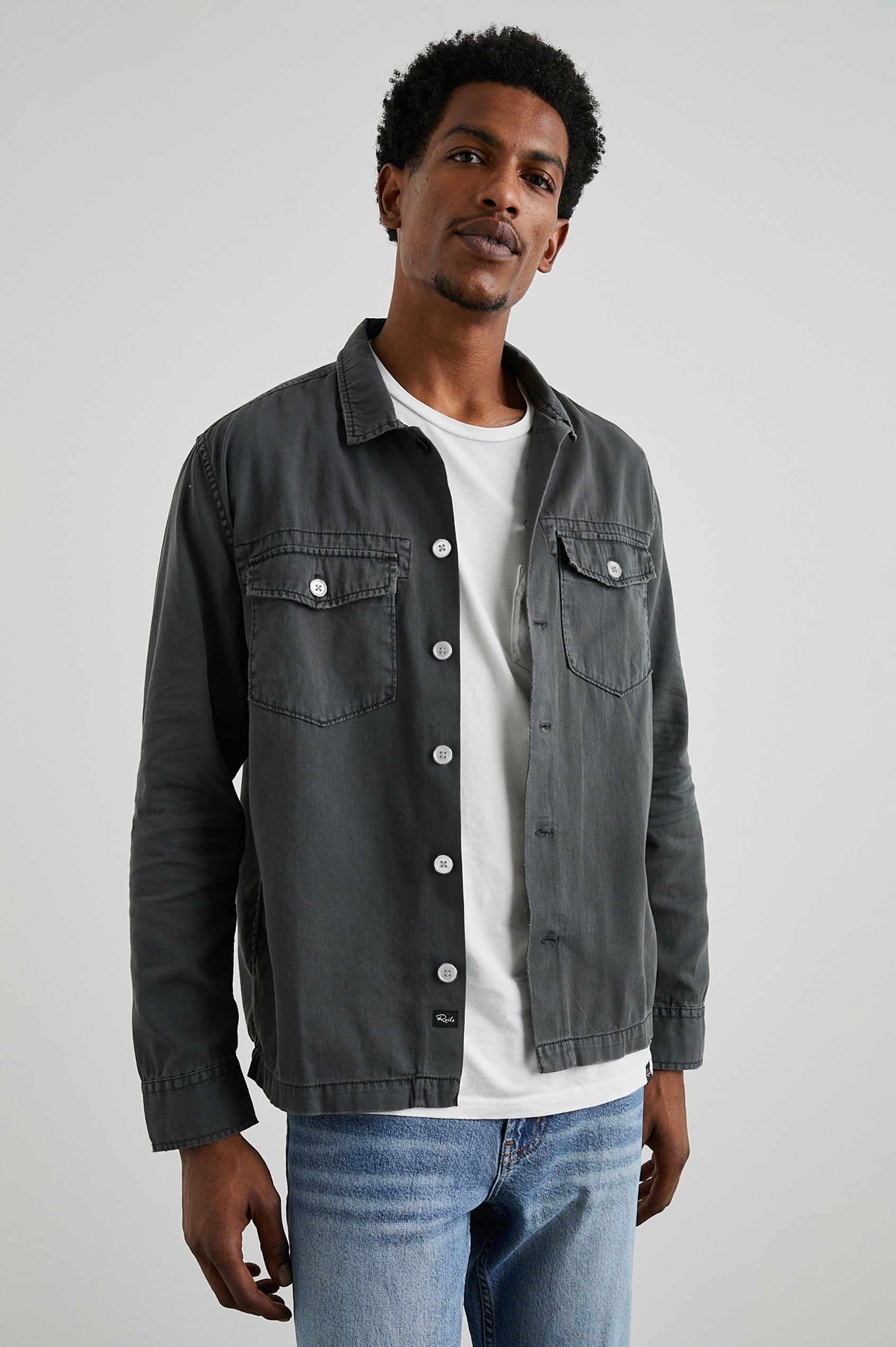 Kerouac Long-Sleeve Shirt Jacket with Button Closure and Two Button Chest Flap Pockets in Charcoal Colorway  - Front Unbuttoned View Featured on Model