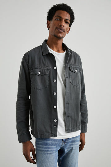 Kerouac Long-Sleeve Shirt Jacket with Button Closure and Two Button Chest Flap Pockets in Charcoal Colorway  - Front Unbuttoned View Featured on Model