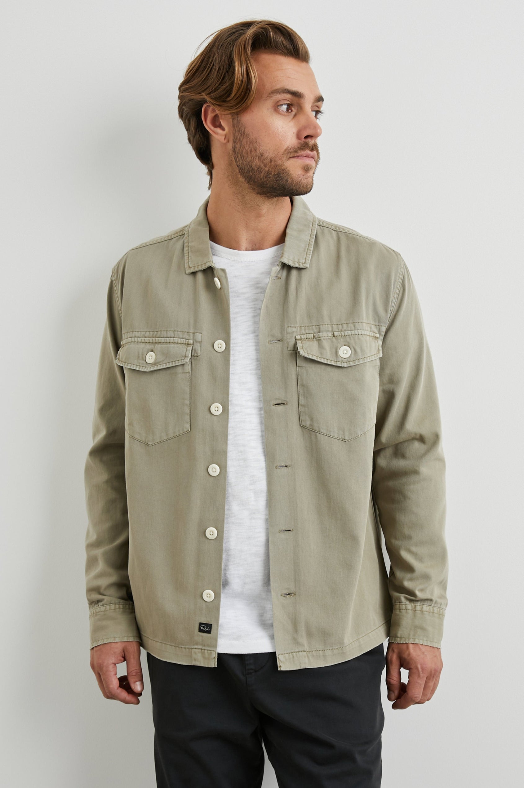 Kerouac Long-Sleeve Shirt Jacket with Button Closure and Two Button Chest Flap Pockets in Natural Colorway  - Front Unbuttoned View Featured on Model