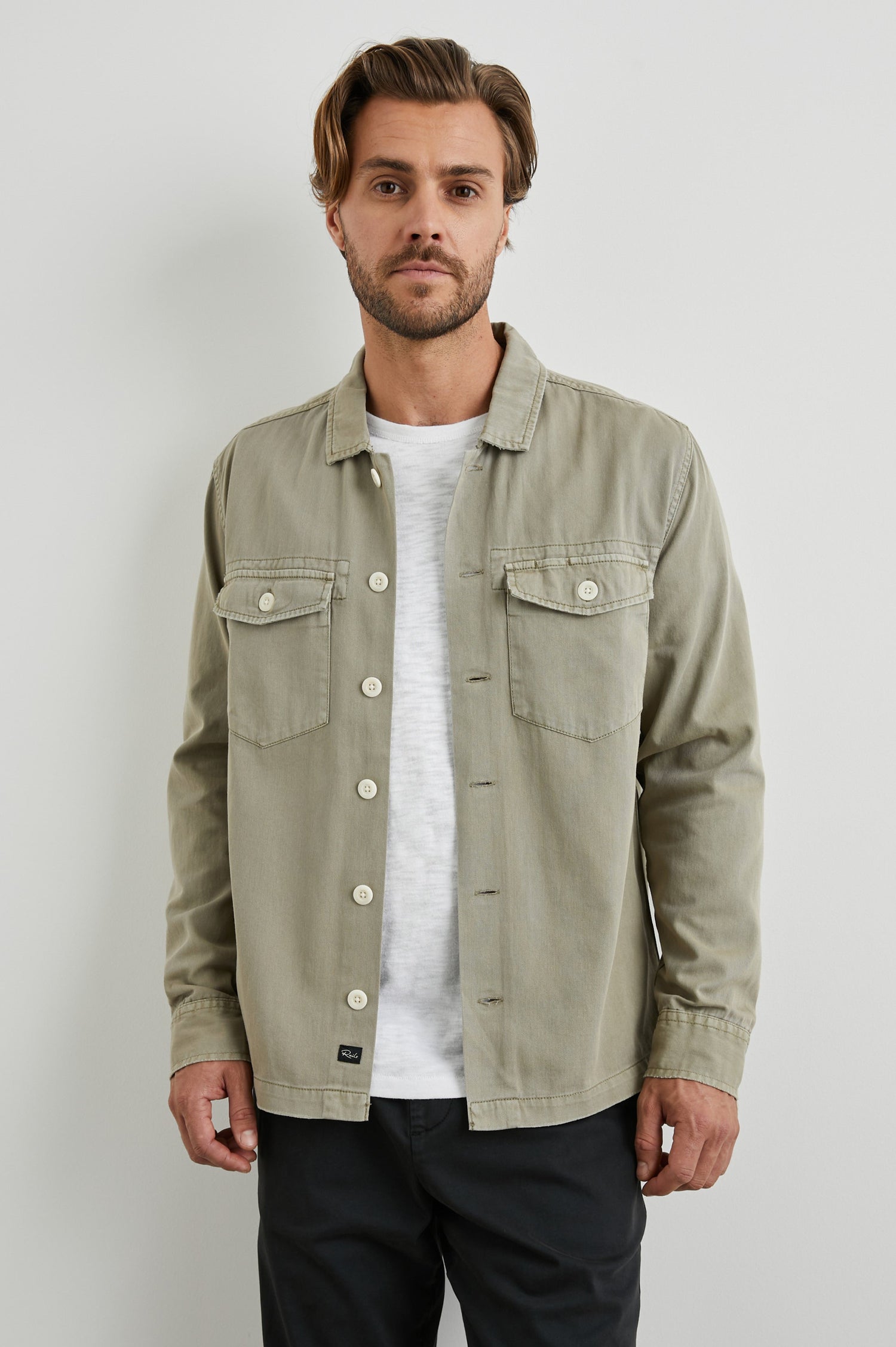 Kerouac Long-Sleeve Shirt Jacket with Button Closure and Two Button Chest Flap Pockets in Natural Colorway  - Front Unbuttoned View Featured on Model