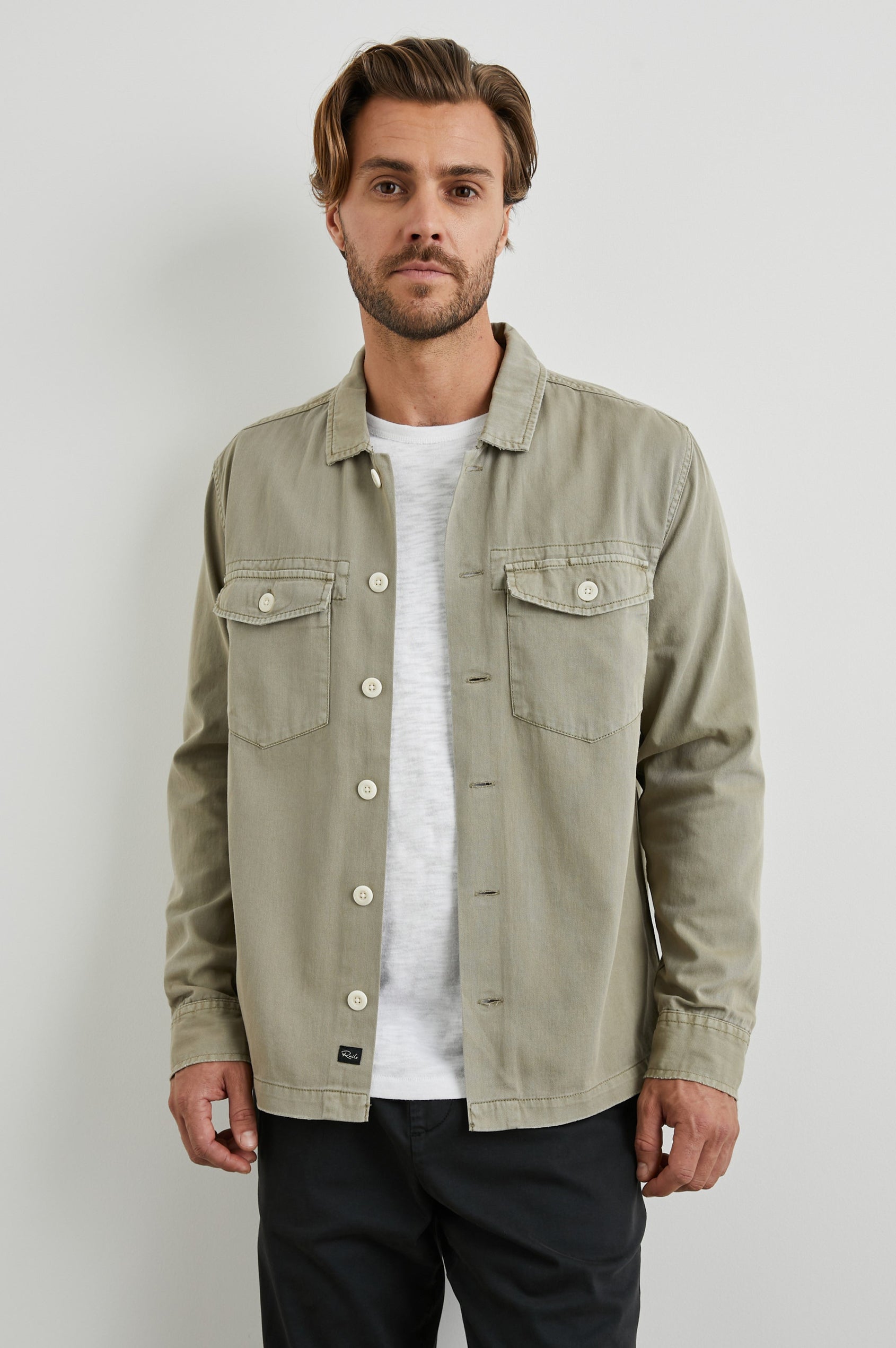 Kerouac Long-Sleeve Shirt Jacket with Button Closure and Two Button Chest Flap Pockets in Natural Colorway  - Front Unbuttoned View Featured on Model