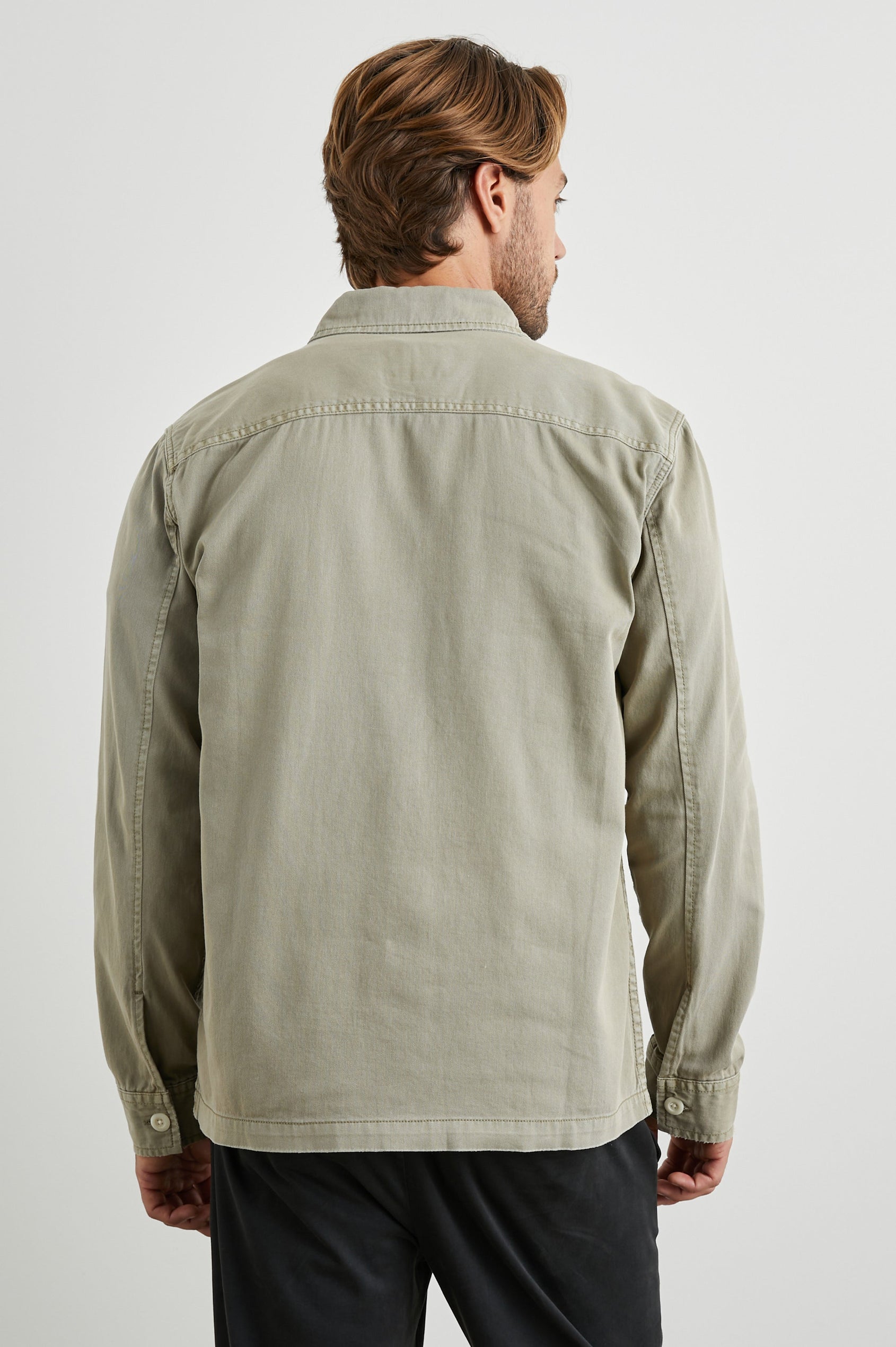 Kerouac Long-Sleeve Shirt Jacket with Button Closure and Two Button Chest Flap Pockets in Natural Colorway  - Back View Featured on Model