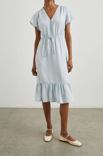 Kiki Short Sleeve Midi Dress with a V Neck, Buttons Down the Front Bodice, a Drawstring Waist and Ruffles at the Hem in Light Vintage Colorway - Front Full Body View Featured on Model 