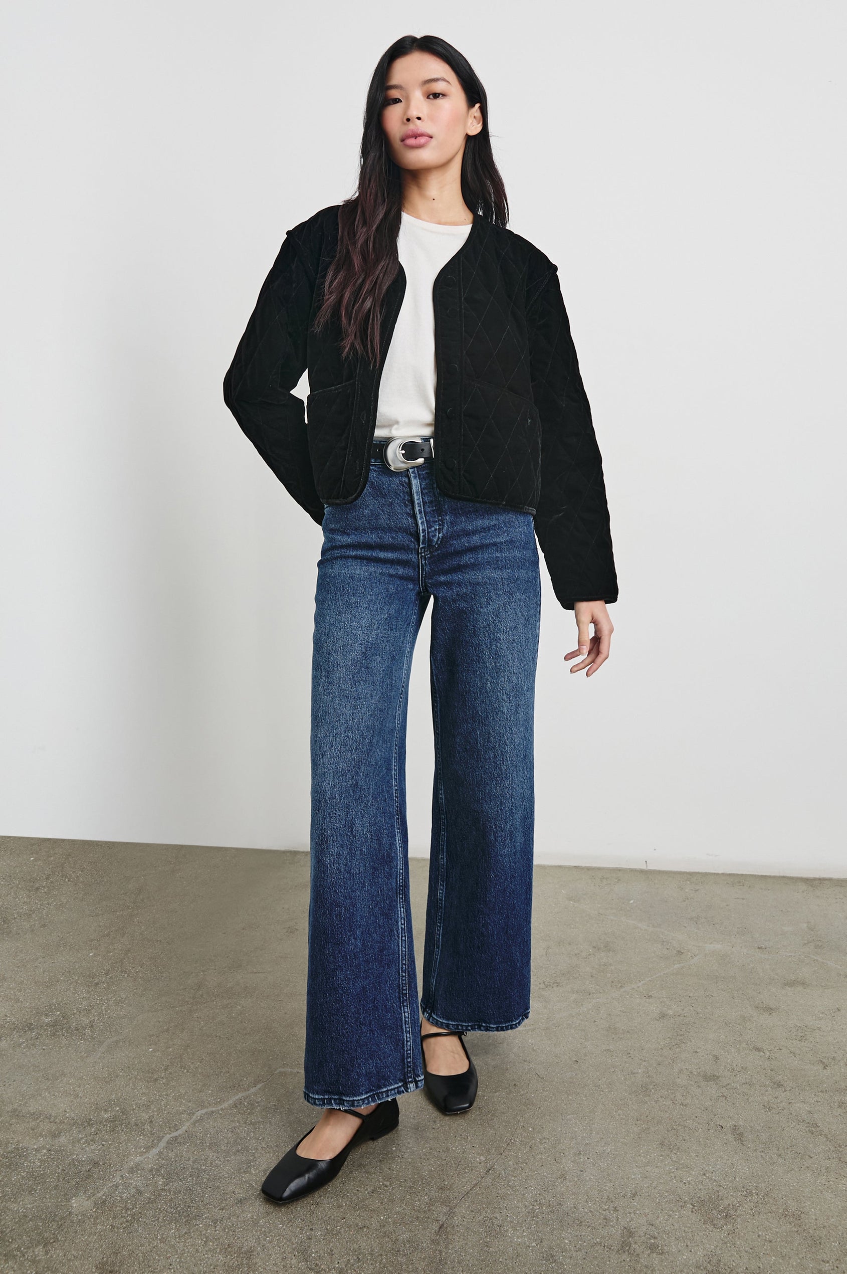 Kiko Jacket with Button Closure, a V Neck, Two Front Patch Pockets and a Quilted Appearance in Black Velvet Colorway - Front Full Body View Featured on Model