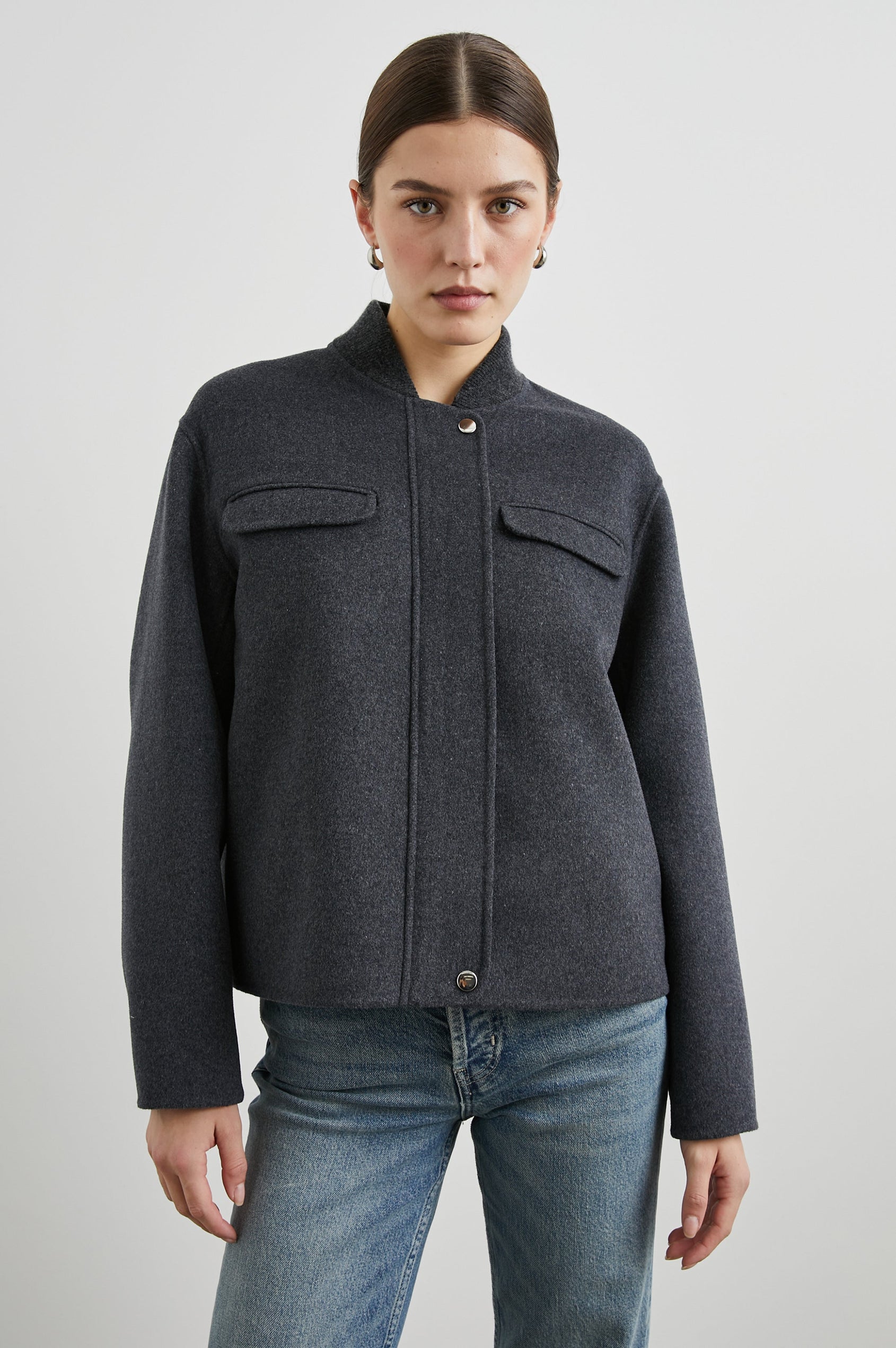 Kinsley Jacket with Zipper and Snap Closure, Two Chest Welt Flap Pockets and two Front Pockets in Charcoal Colorway - Front View Featured on Model