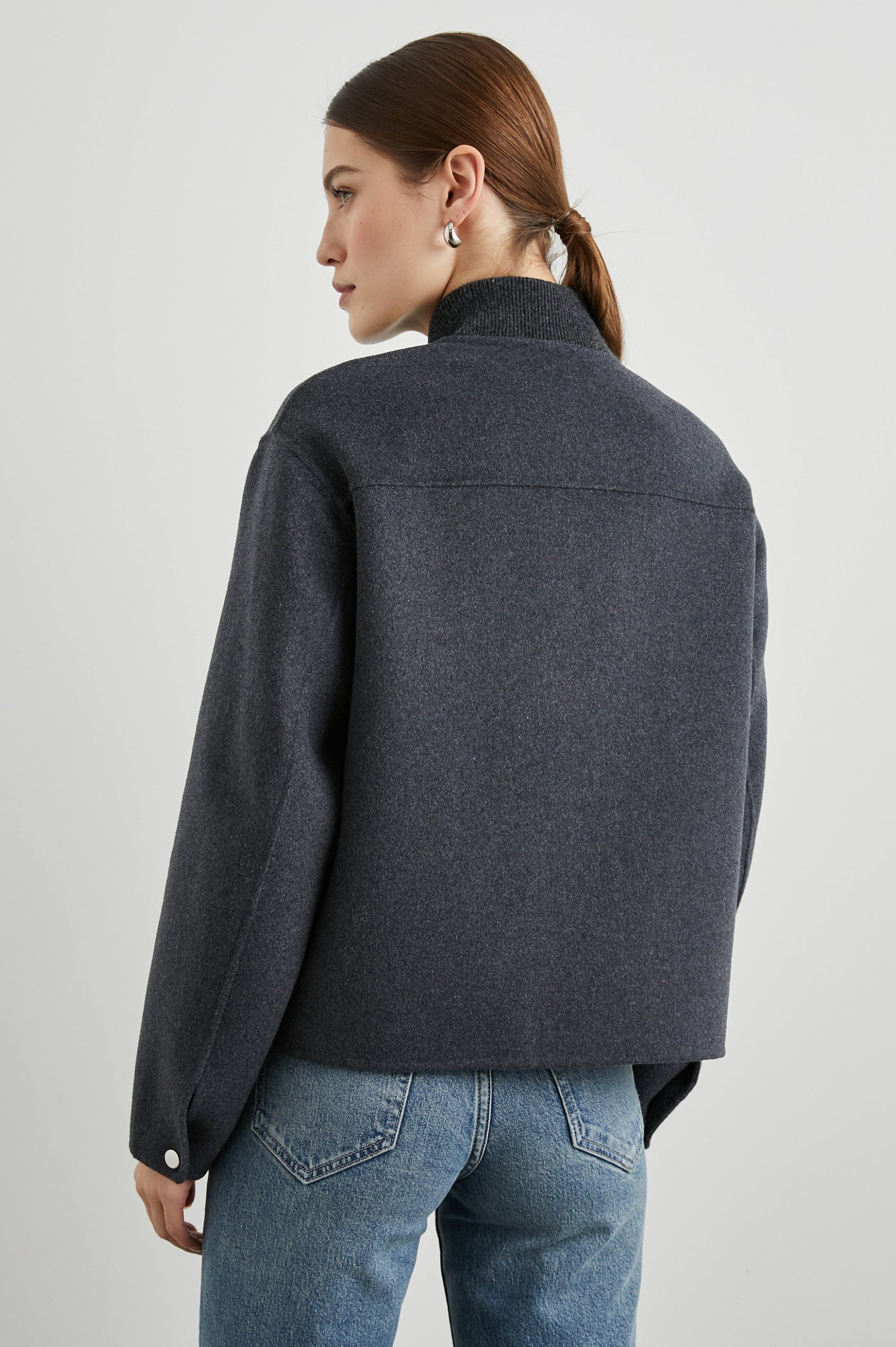 Kinsley Jacket with Zipper and Snap Closure, Two Chest Welt Flap Pockets and two Front Pockets in Charcoal Colorway - Back View Featured on Model