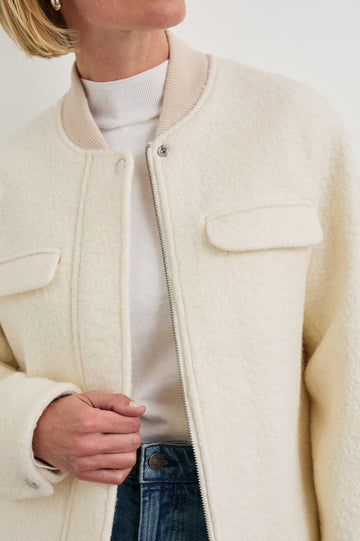 Kinsley Jacket with Zipper and Snap Closure, Two Chest Welt Flap Pockets and two Front Pockets in Ivory Colorway - Front View Featured on Model