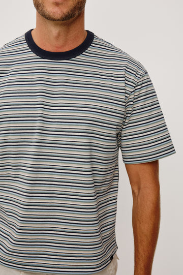 Kip T-Shirt in Relaxed Boxy Fit in Yarn-Dyed Jersey, Contrast Crew Neckline, and Short Sleeves in Azul Stripe Colorway - Upper Body Close Up Front View Featured on Model