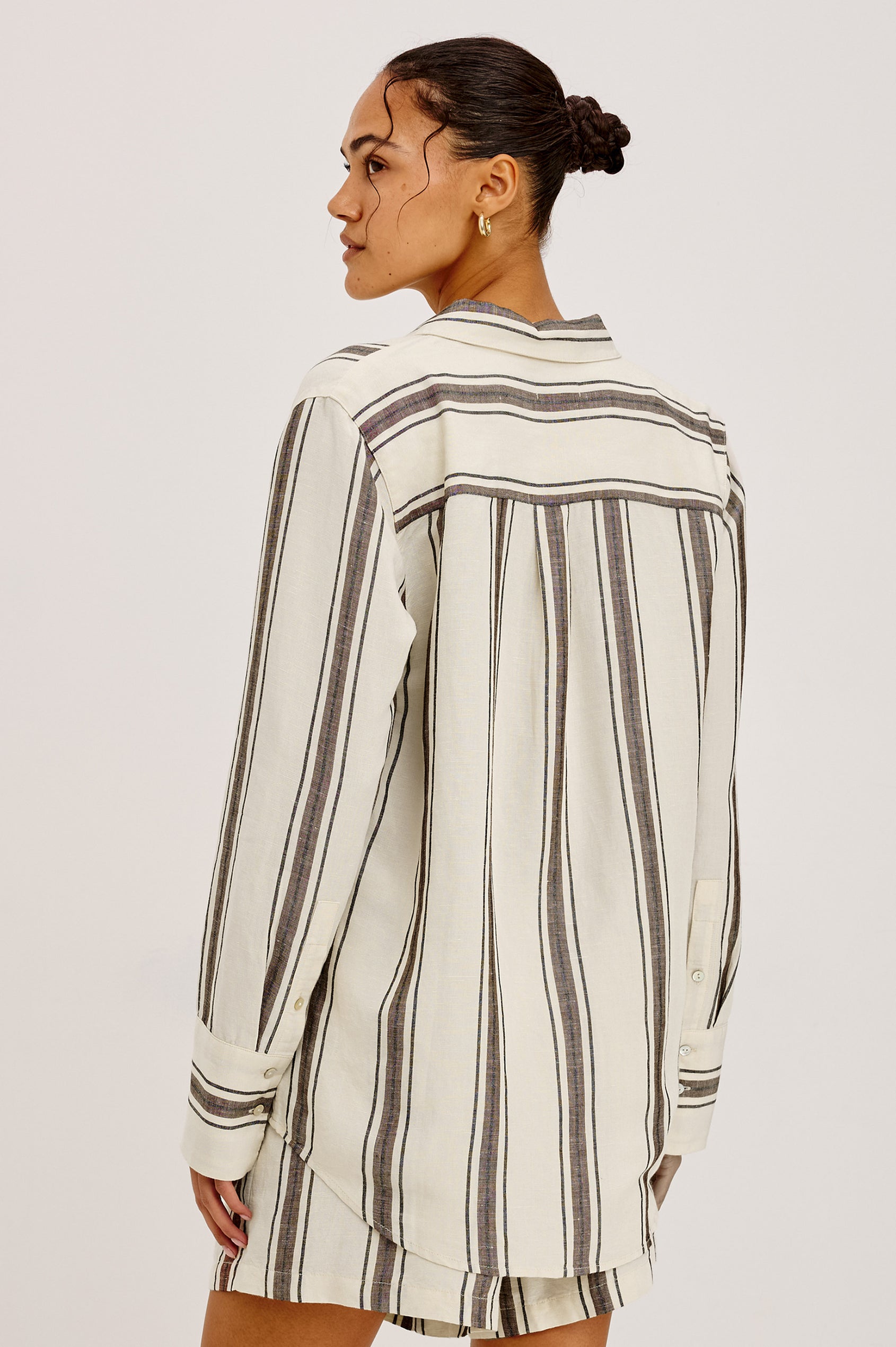 Knox Button-Up Shirt in Linen Viscose With Collar, Front Buttons, Long Sleeves, and Relaxed Fit in Sequoia Stripe Colorway - Upper Body Back View Featured on Model