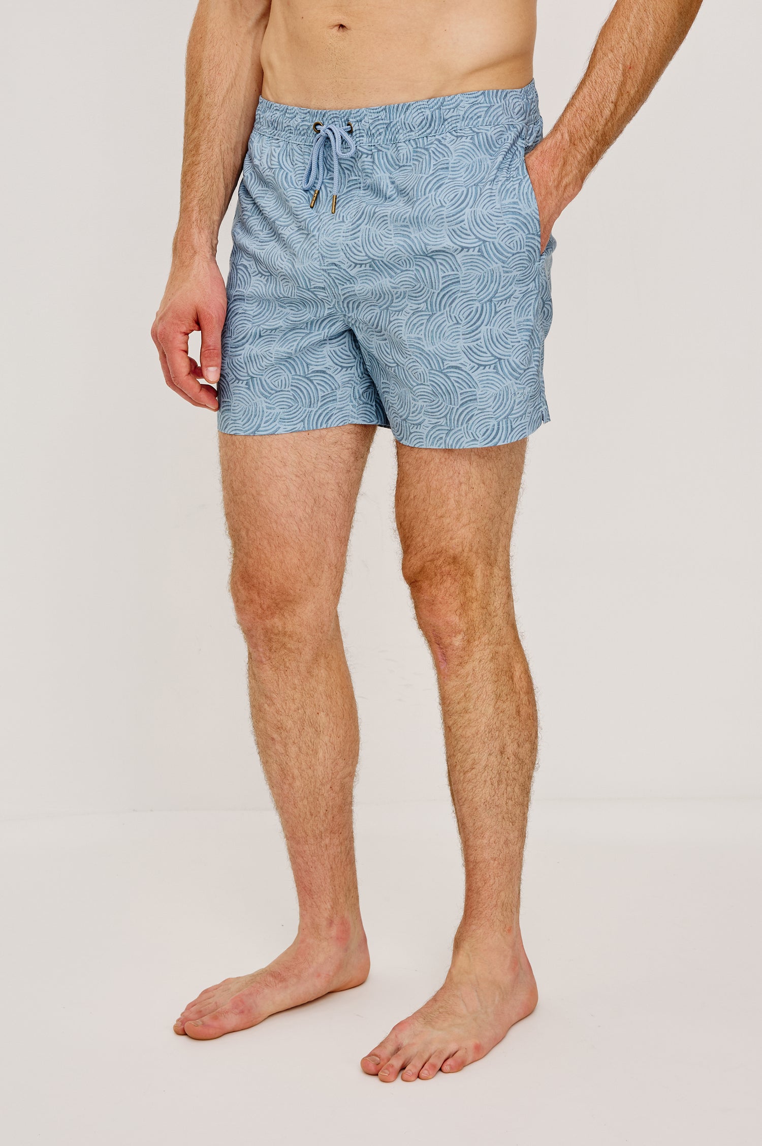 La Brea Mid-Length Swim Shorts With Adjustable Waist Drawstring Ties and Side Pockets in Conch Blue Colorway - Full Body Front View Featured on Model