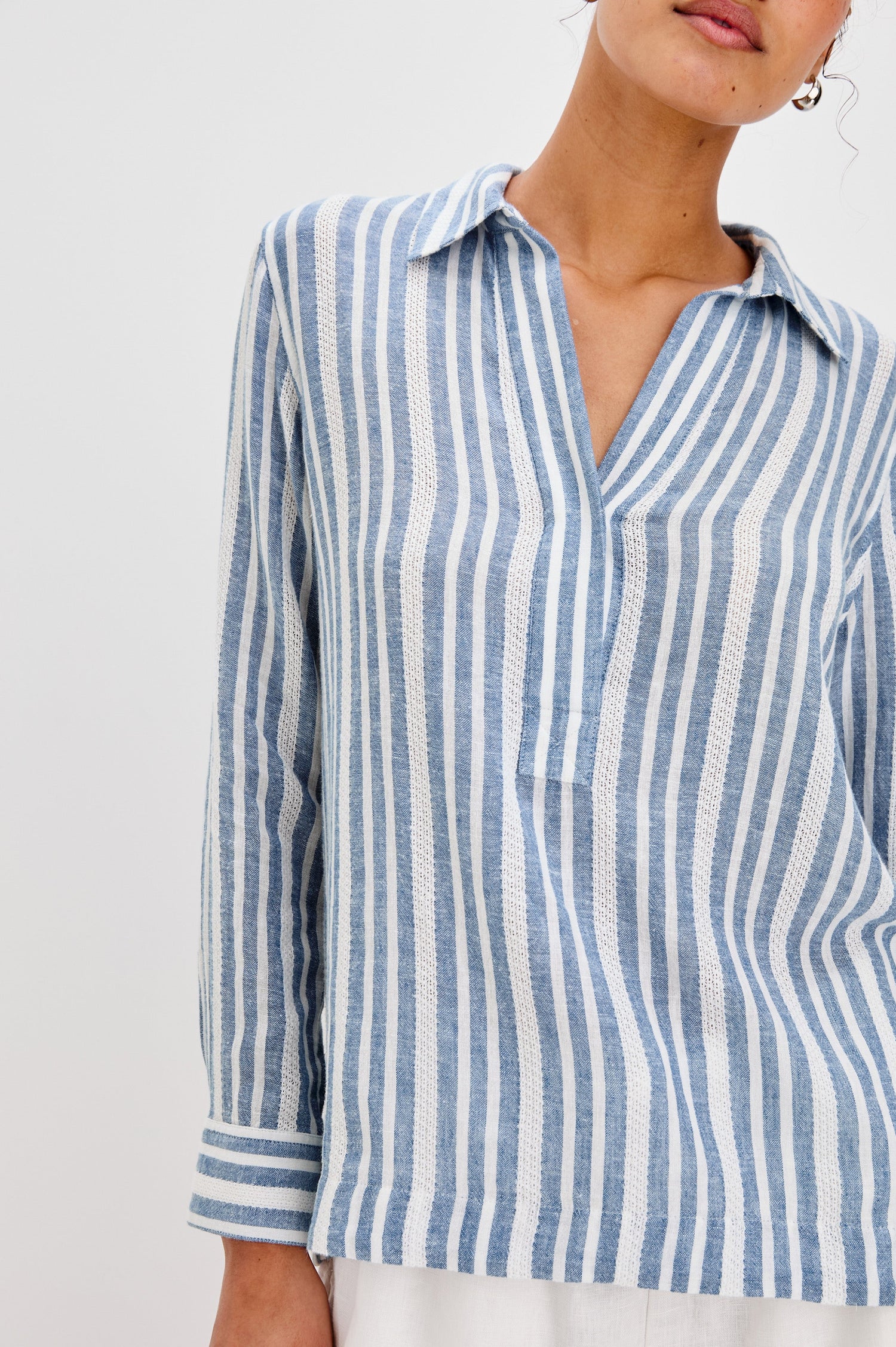 Lagoon Collared Shirt with Long Sleeves and a Hidden Half Button Front Placket in Jalisco Colorway. Front Detailed View Shown on Model.