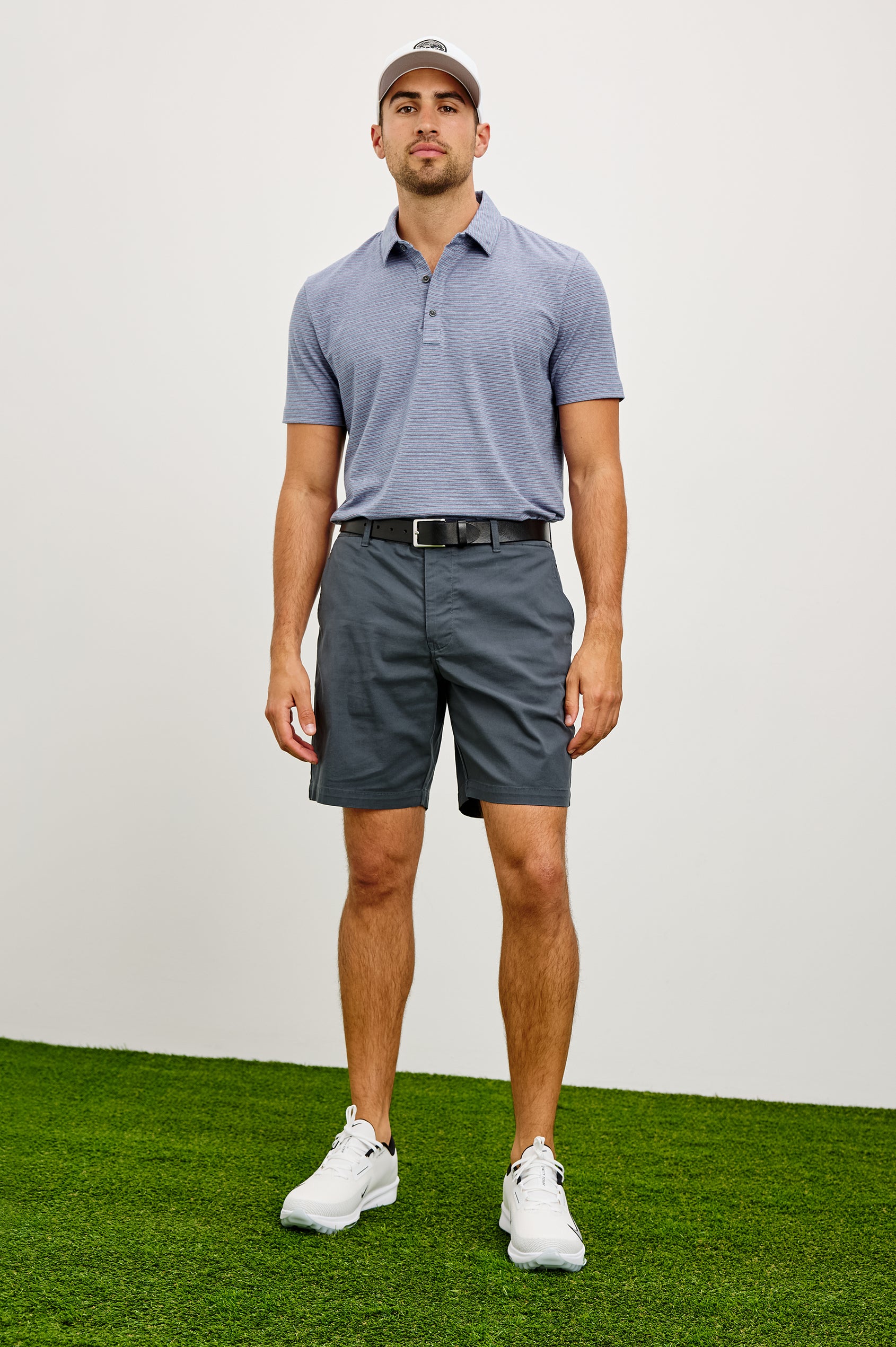Laguna Mid-Length Short in Light Stretch Cotton With Belt Loops and Side Zip Pockets in Slate Grey Colorway - Full Body Front View Featured on Model