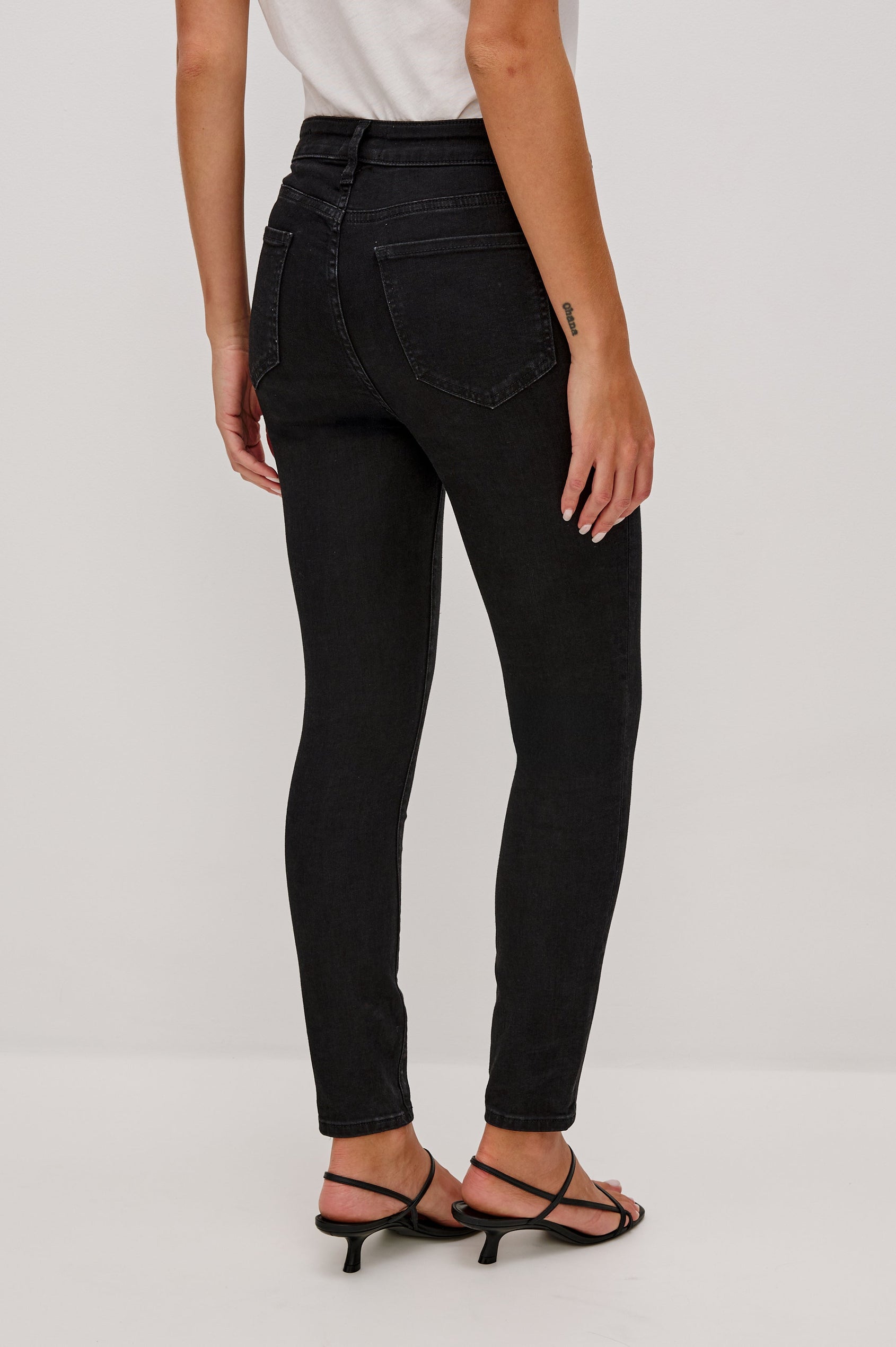 Larchmont 5-pocket Skinny Jean in Black Onyx Colorway. Back View Shown on Model.
