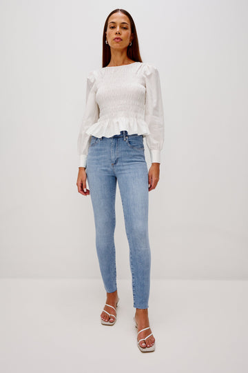 Larchmont 5-pocket skinny jean in medium-light wash tidepool. Full Body Front View Shown on Model.