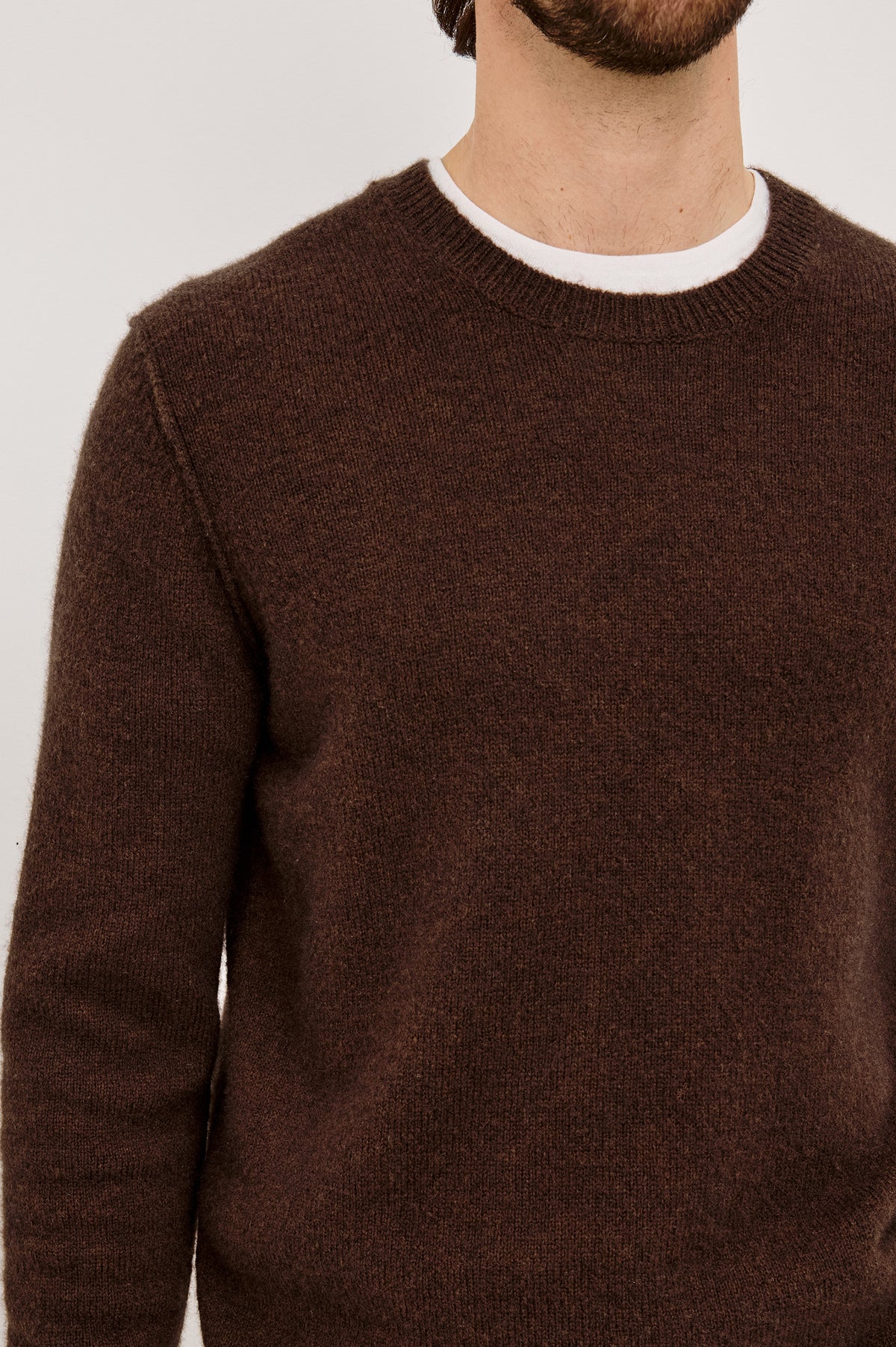 Laurent Sweater in Merino Wool Cashmere Blend With Relaxed Fit, Reversed Linking Seams at Arm Holes, and Long Sleeves in Chestnut Colorway - Upper Body Front View Featured on Model