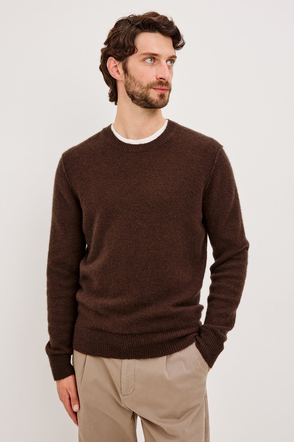 Laurent Sweater in Merino Wool Cashmere Blend With Relaxed Fit, Reversed Linking Seams at Arm Holes, and Long Sleeves in Chestnut Colorway - Upper Body Front View Featured on Model