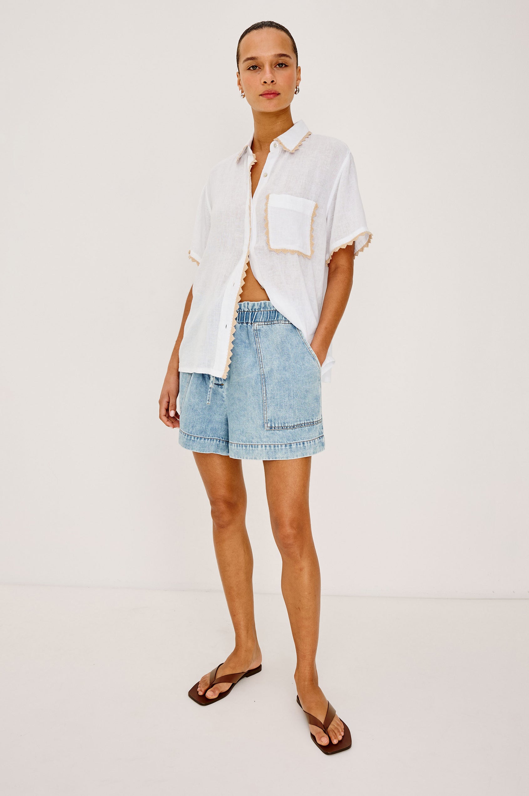 Lea Top in Luxe Linen With Relaxed Fit, Split V-Neck, Crochet Trim, and Flutter Sleeves With Natural Crochet Colorway - Full Body Front View Featured on Model