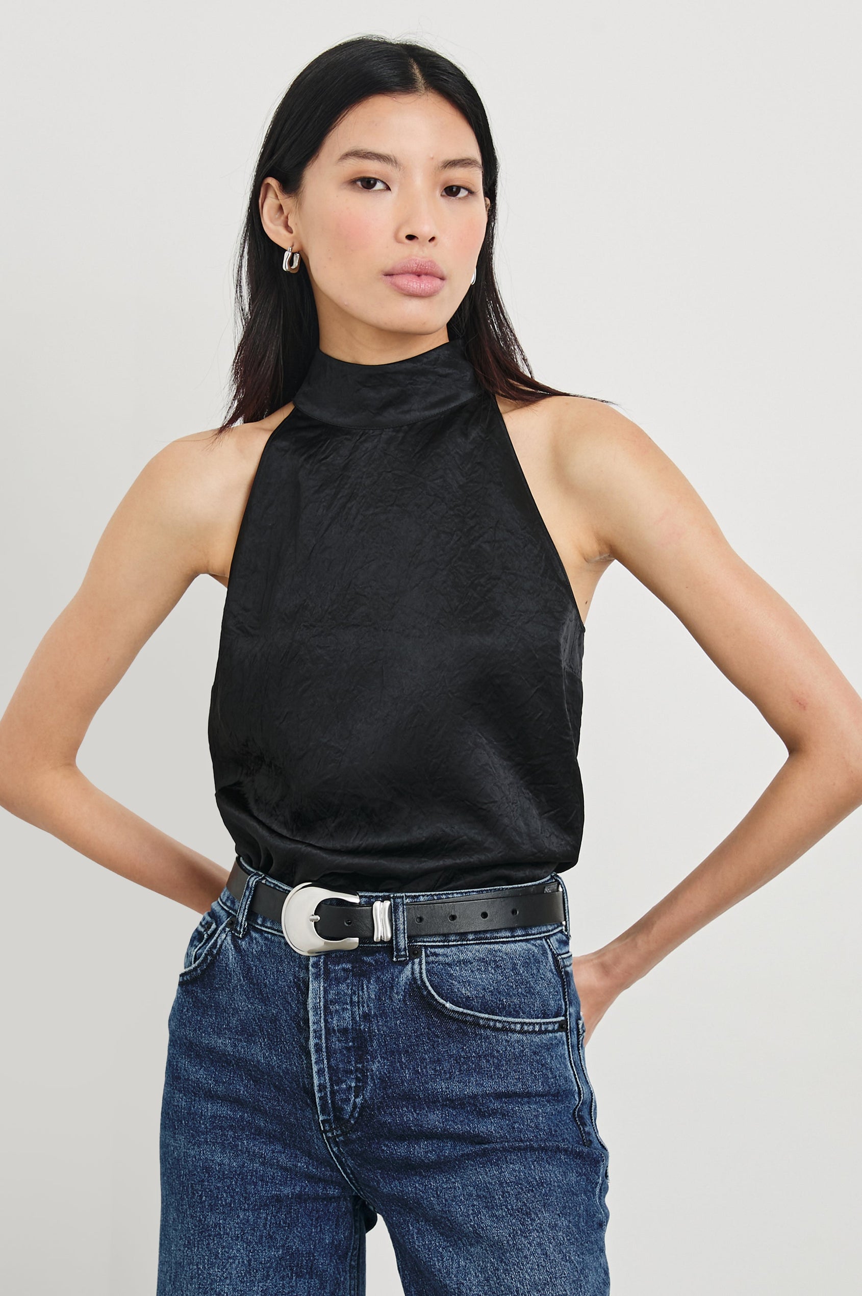 Leah Top with High Neck Halter Top with Back Button Closure in Black Crinkle Colorway - Front Tucked View Featured on Model
