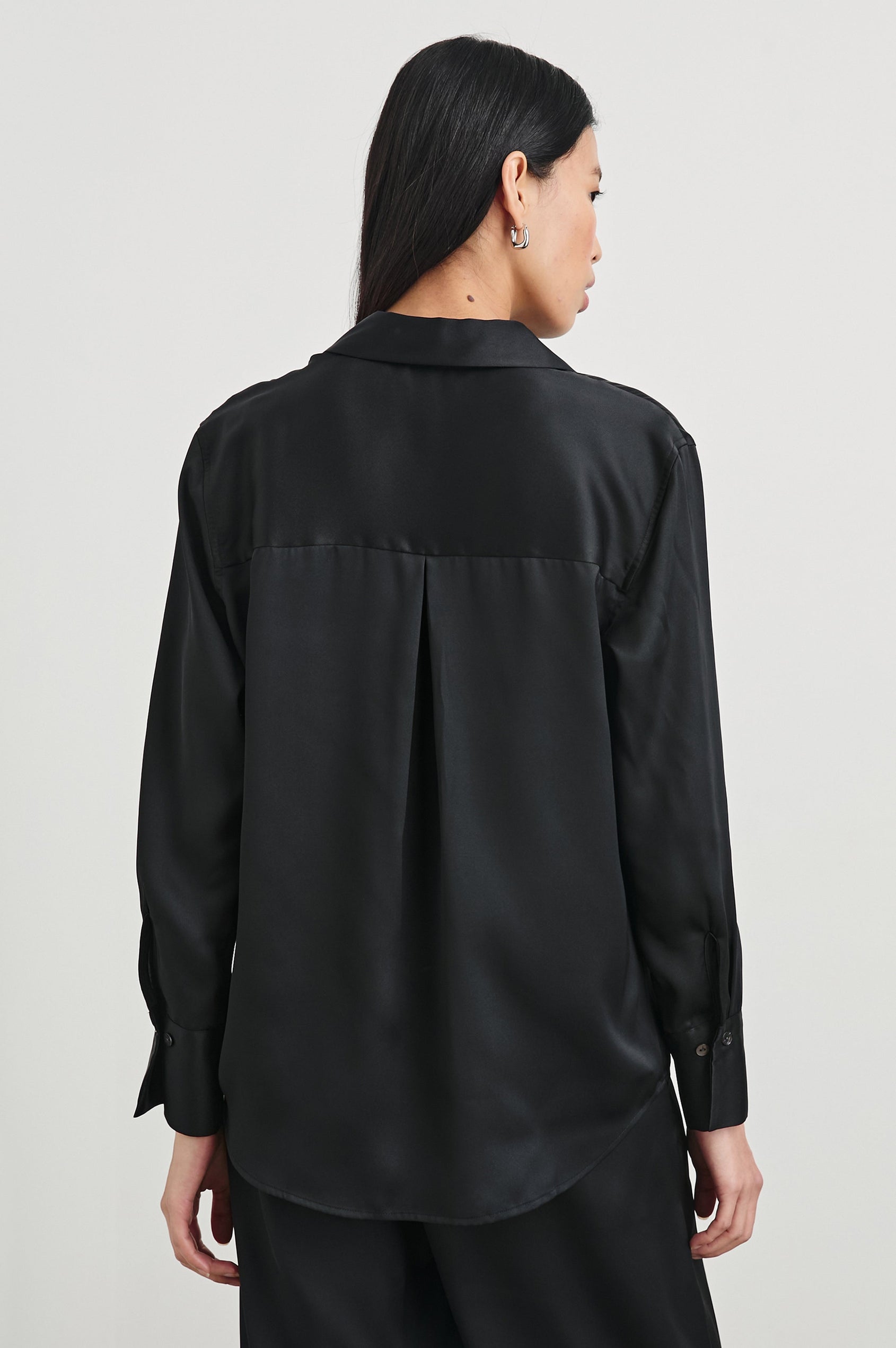 Ledger Long-Sleeve Button Down in Black Colorway - Back View Featured on Model