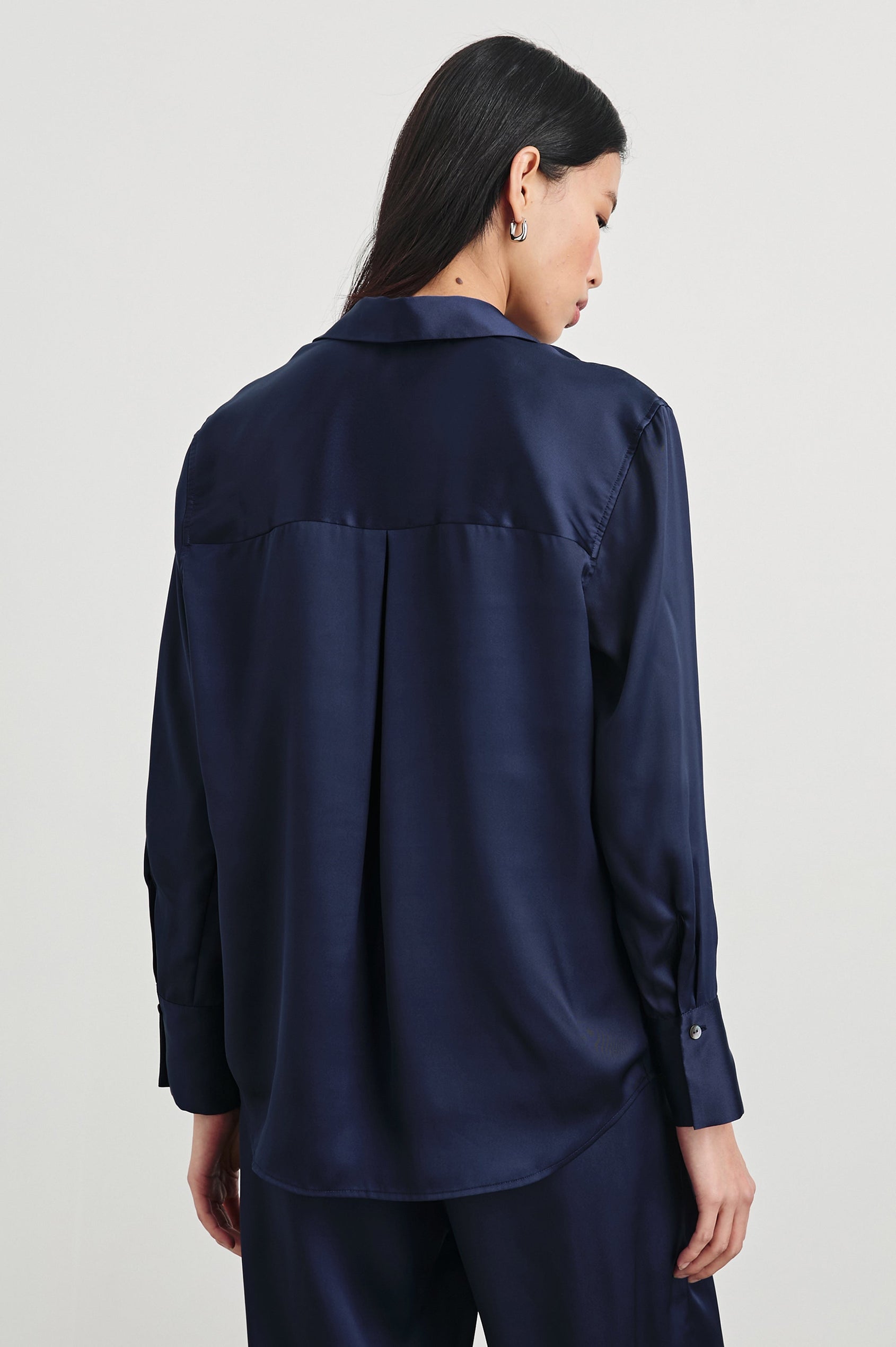 Ledger Long-Sleeve Button Down in Navy Colorway - Back View Featured on Model