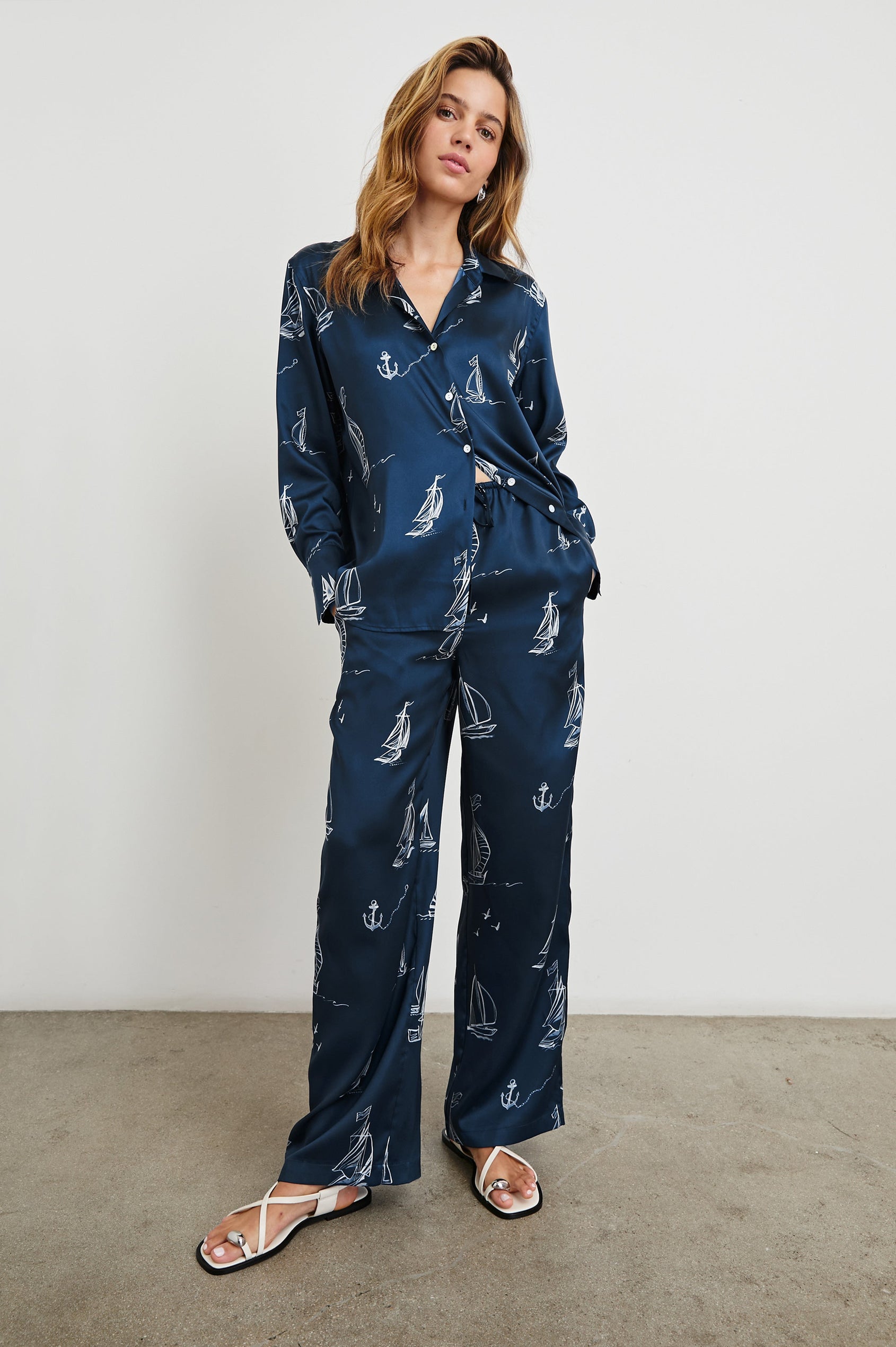 Ledger Long-Sleeve Button Down in Sailboats Colorway, with white sailboats on dark blue - Front Full Body View Featured on Model