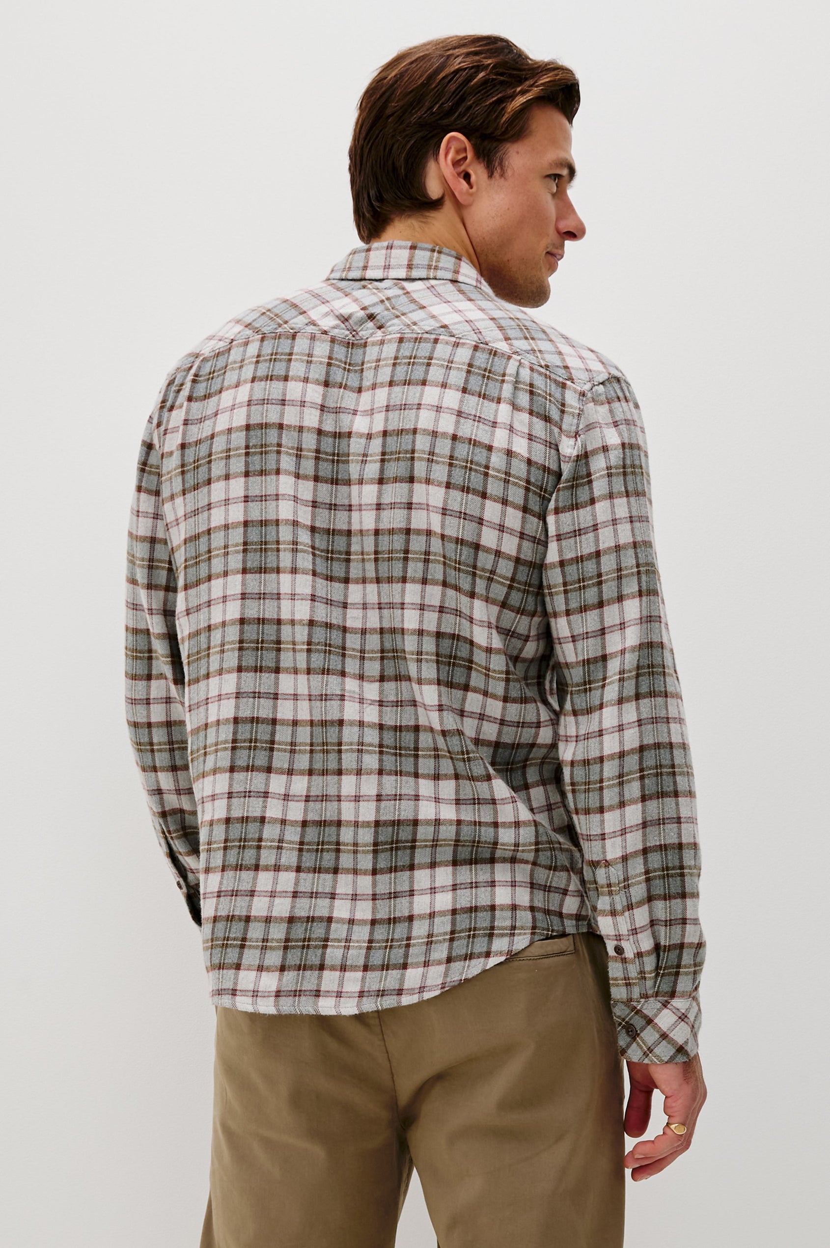 Lennox Long-Sleeve Button Up with a Chest Patch Pocket in Charcoal Autumn Melange Colorway, a plaid in Charcoal, Burnt Orange and White - Back View Featured on model.