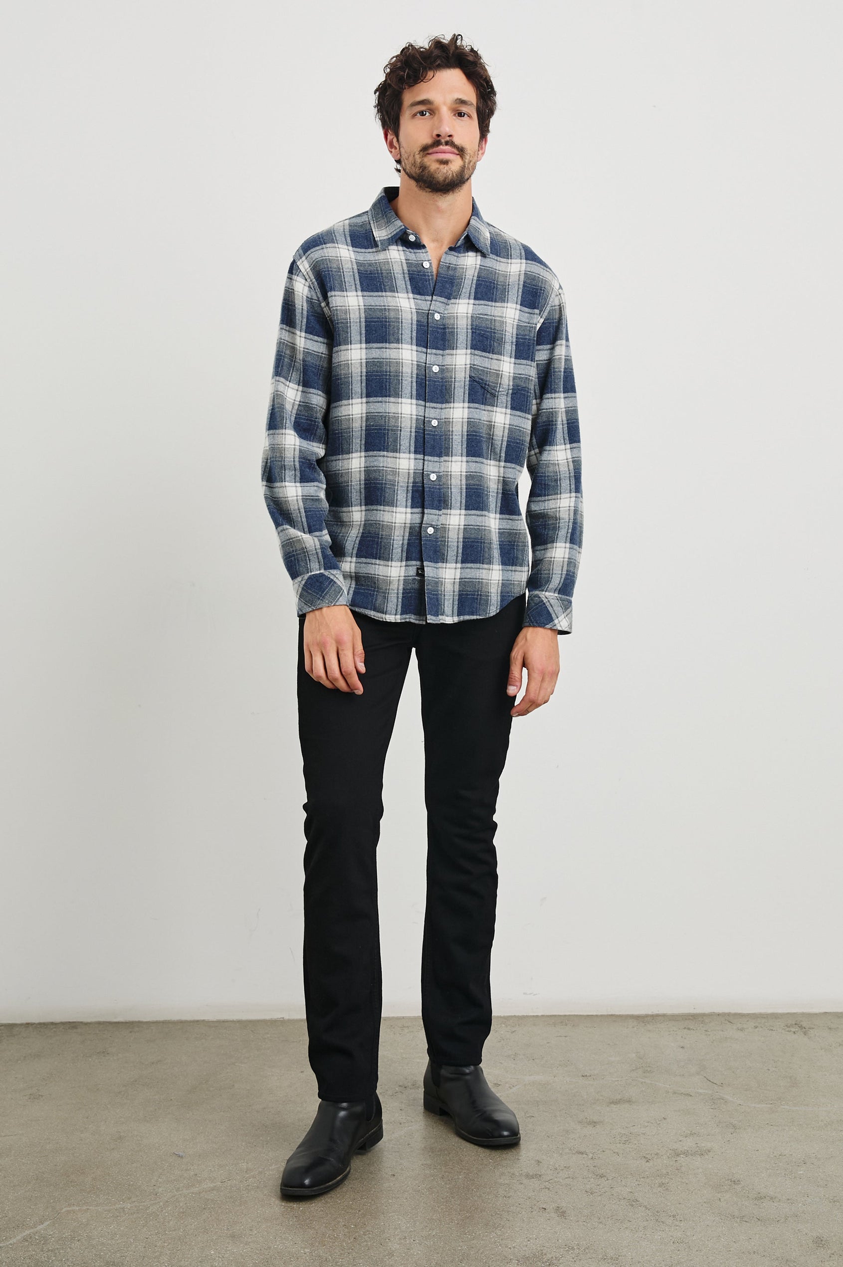 Lennox Long-Sleeve Button Up with a Chest Patch Pocket in Charcoal Lapis Colorway, a plaid in Charcoal, Lapis and White - Front Full Body View Featured on model
