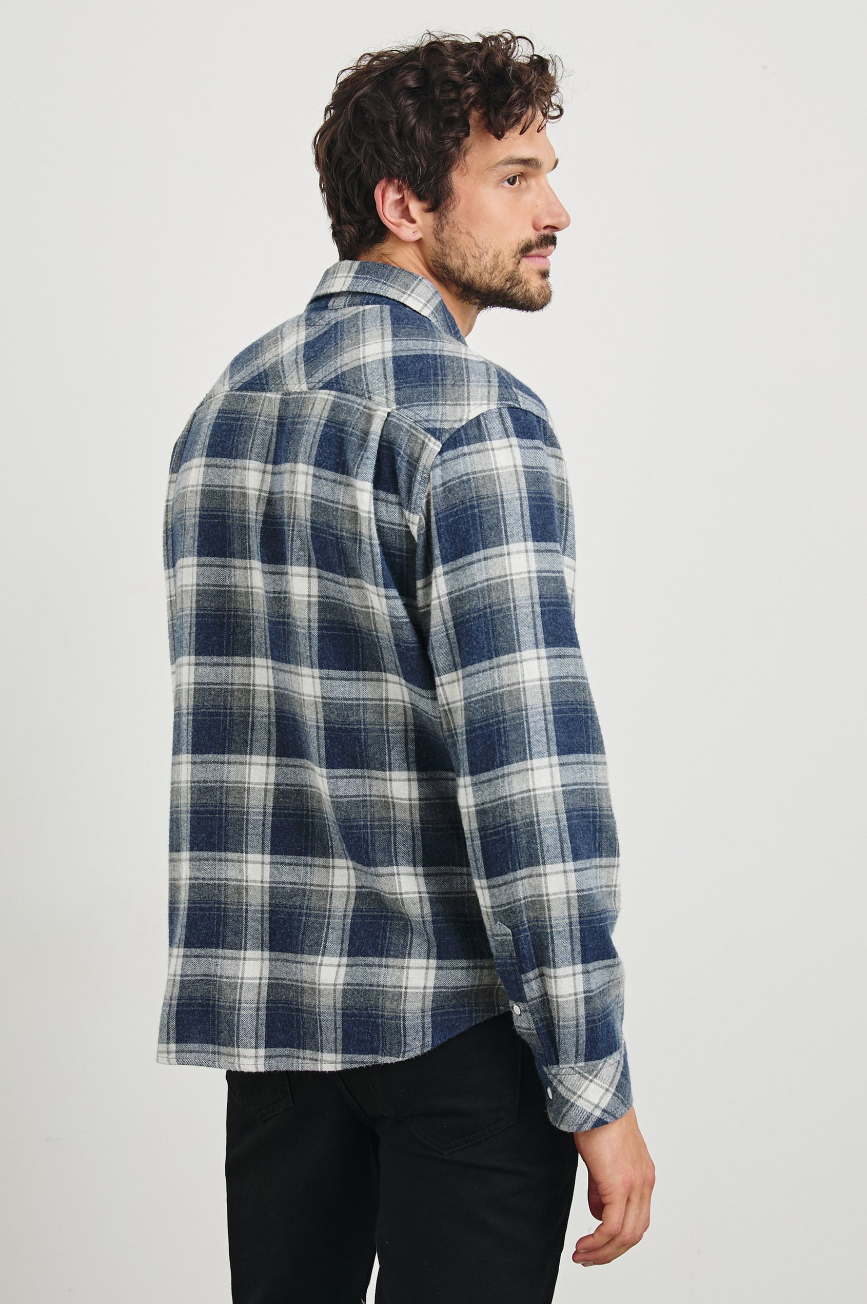 Lennox Long-Sleeve Button Up with a Chest Patch Pocket in Charcoal Lapis Colorway, a plaid in Charcoal, Lapis and White - Back View Featured on model