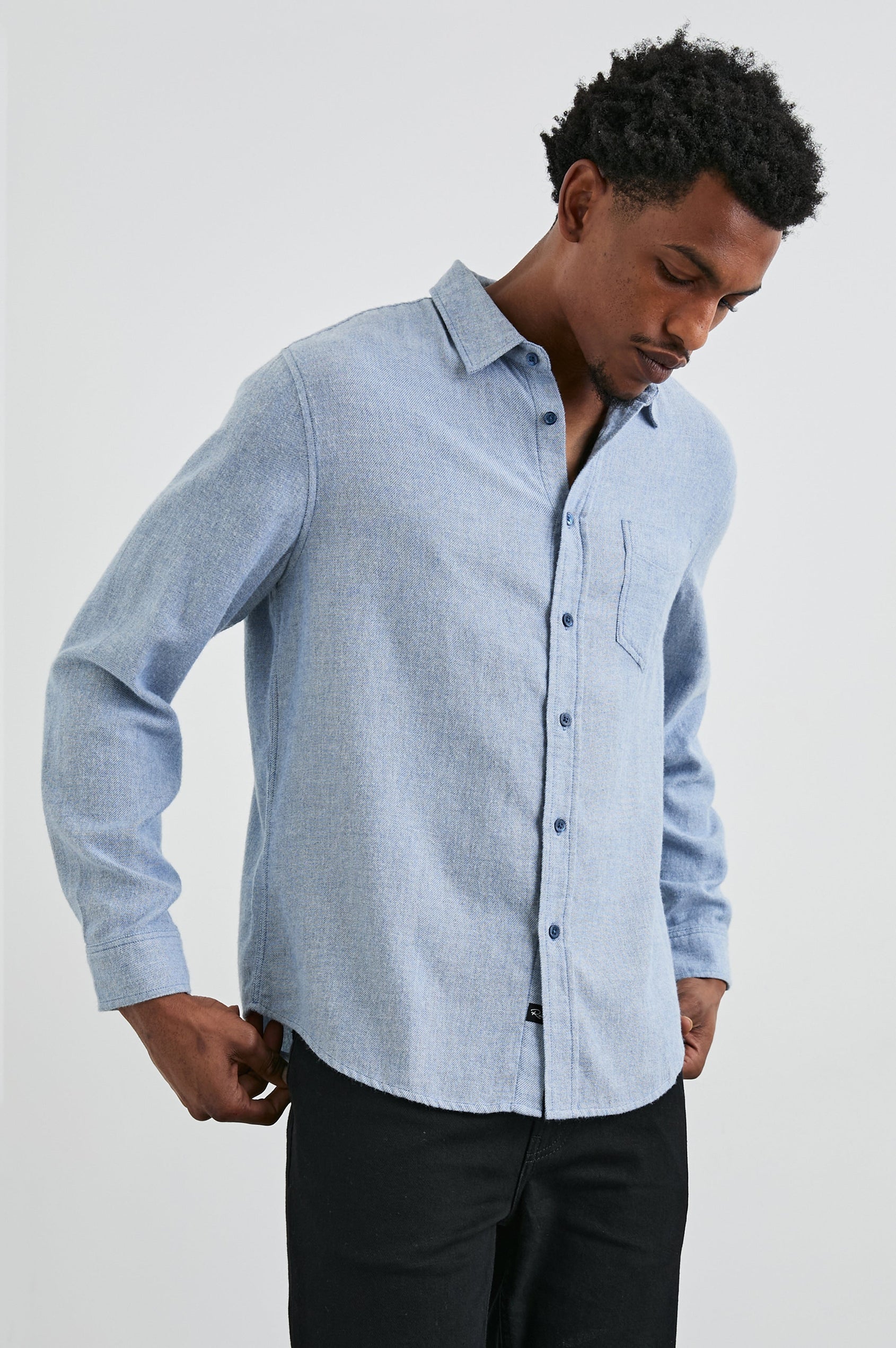 Lennox Long-Sleeve Button Up with a Chest Patch Pocket in Kodiak Blue Melange Colorway - Front View Featured on Model
