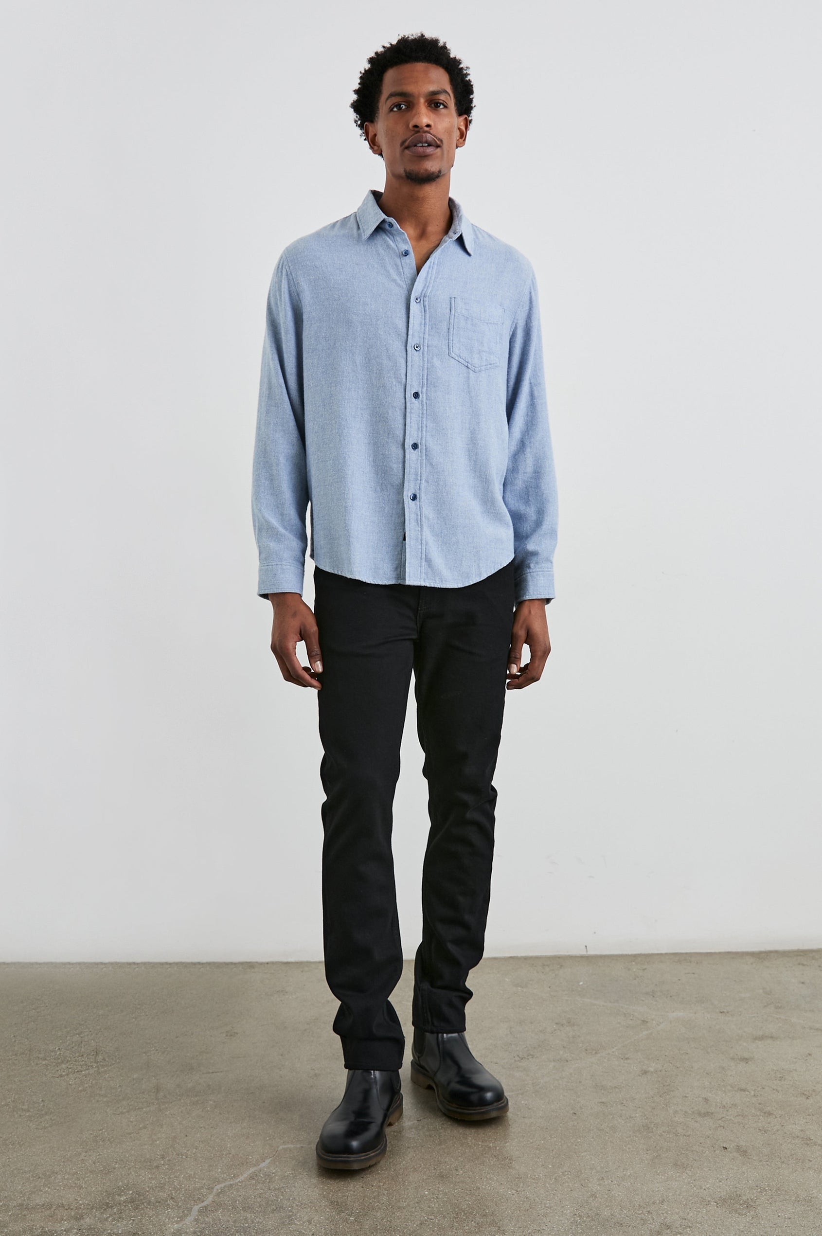 Lennox Long-Sleeve Button Up with a Chest Patch Pocket in Kodiak Blue Melange Colorway - Front Full Body View Featured on Model