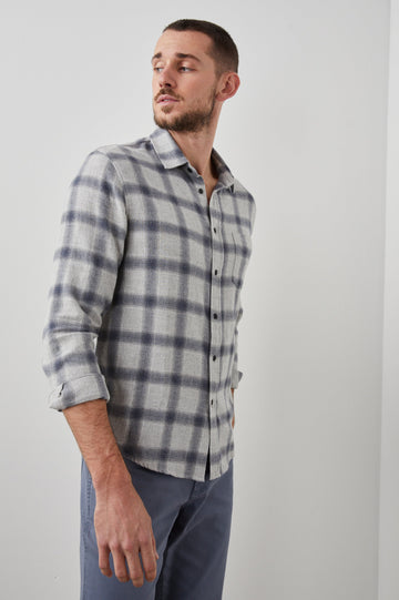 Lennox Long-Sleeve Button Up with a Chest Patch Pocket in Metallic Storm Heather Colorway, a plaid in Grey and Blue - Front View Featured on Model