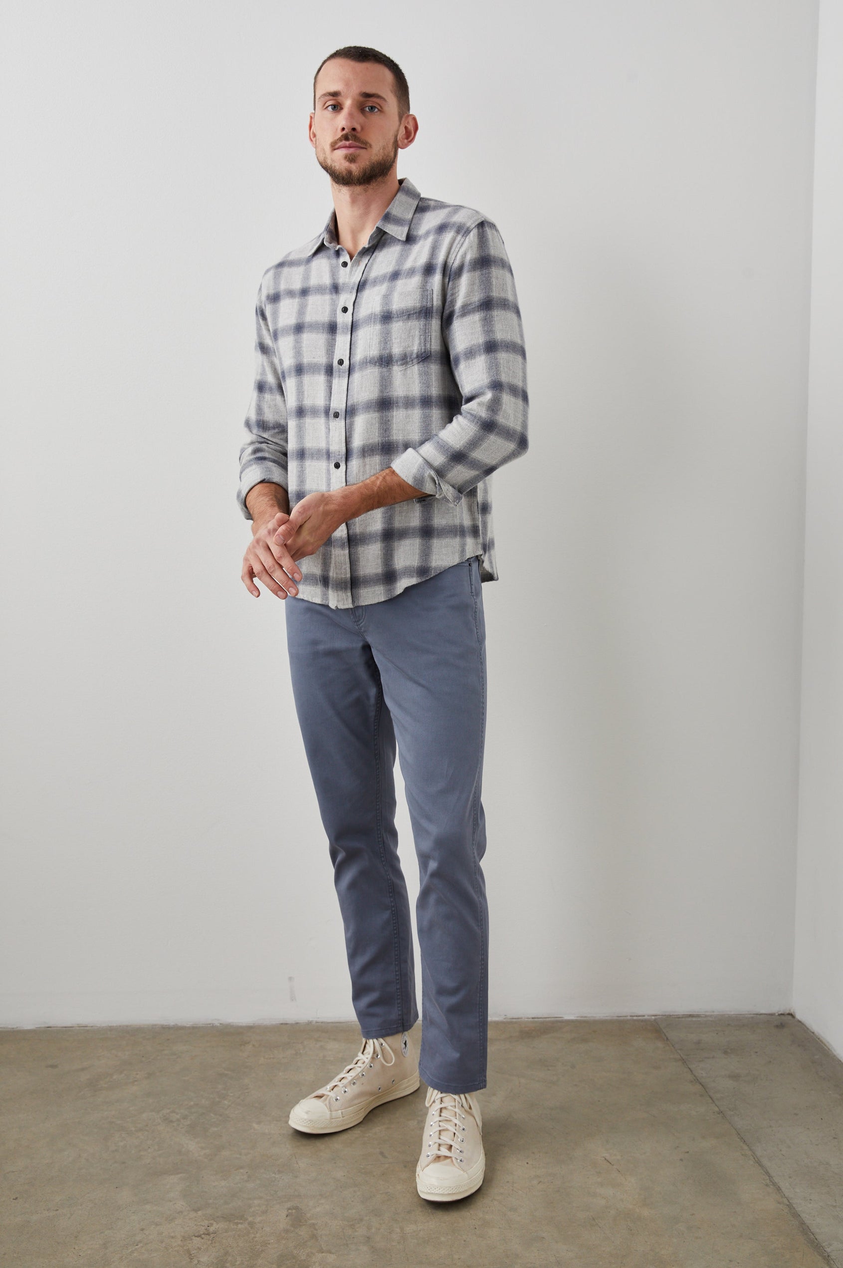 Lennox Long-Sleeve Button Up with a Chest Patch Pocket in Metallic Storm Heather Colorway, a plaid in Grey and Blue - Front Full Body View Featured on Model